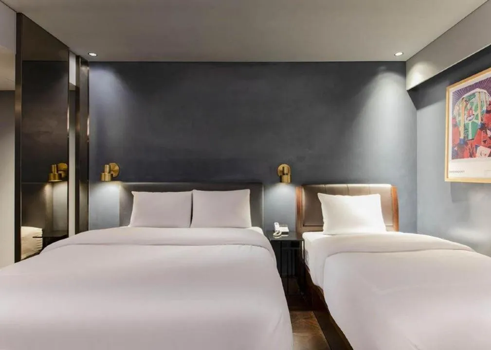 Bed in Sillim Dominique Hotel