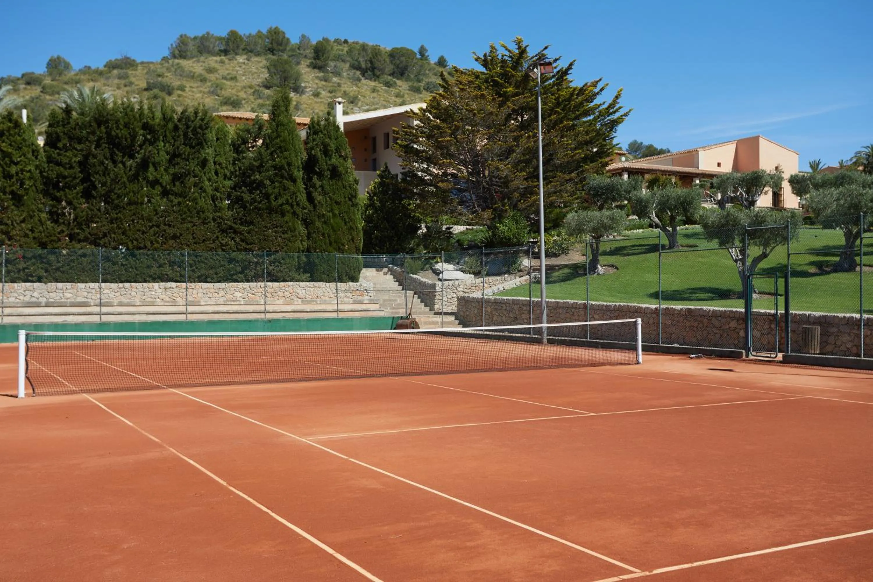 Tennis court in Pula Suites Boutique Resort