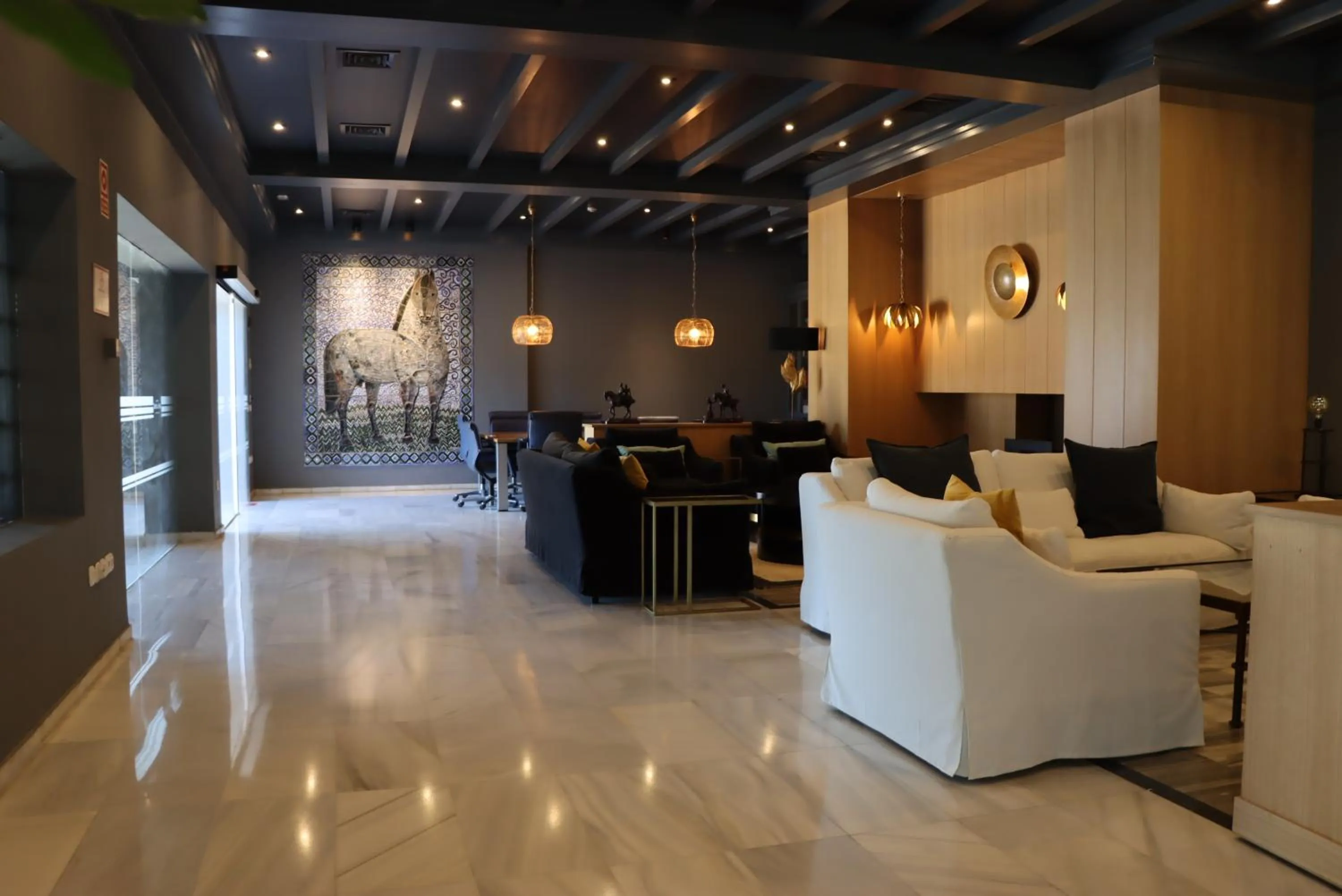 Communal lounge/ TV room in Hotel Jerez & Spa