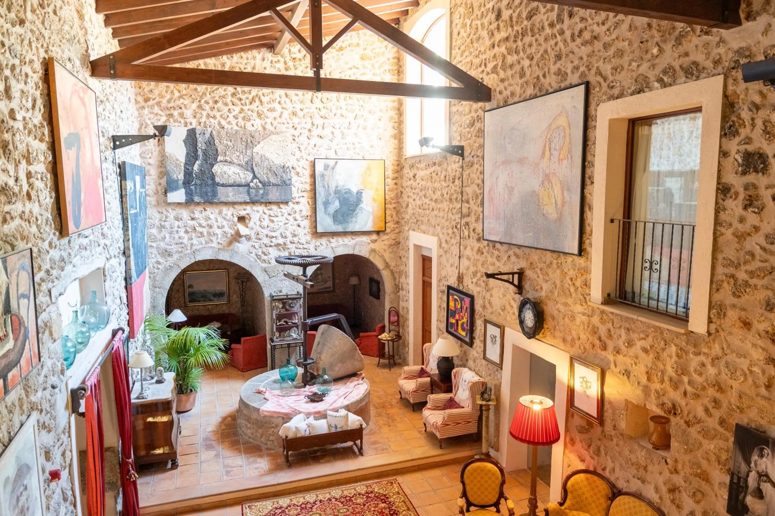 Communal lounge/ TV room in Hotel Rural S'Olivaret & Spa