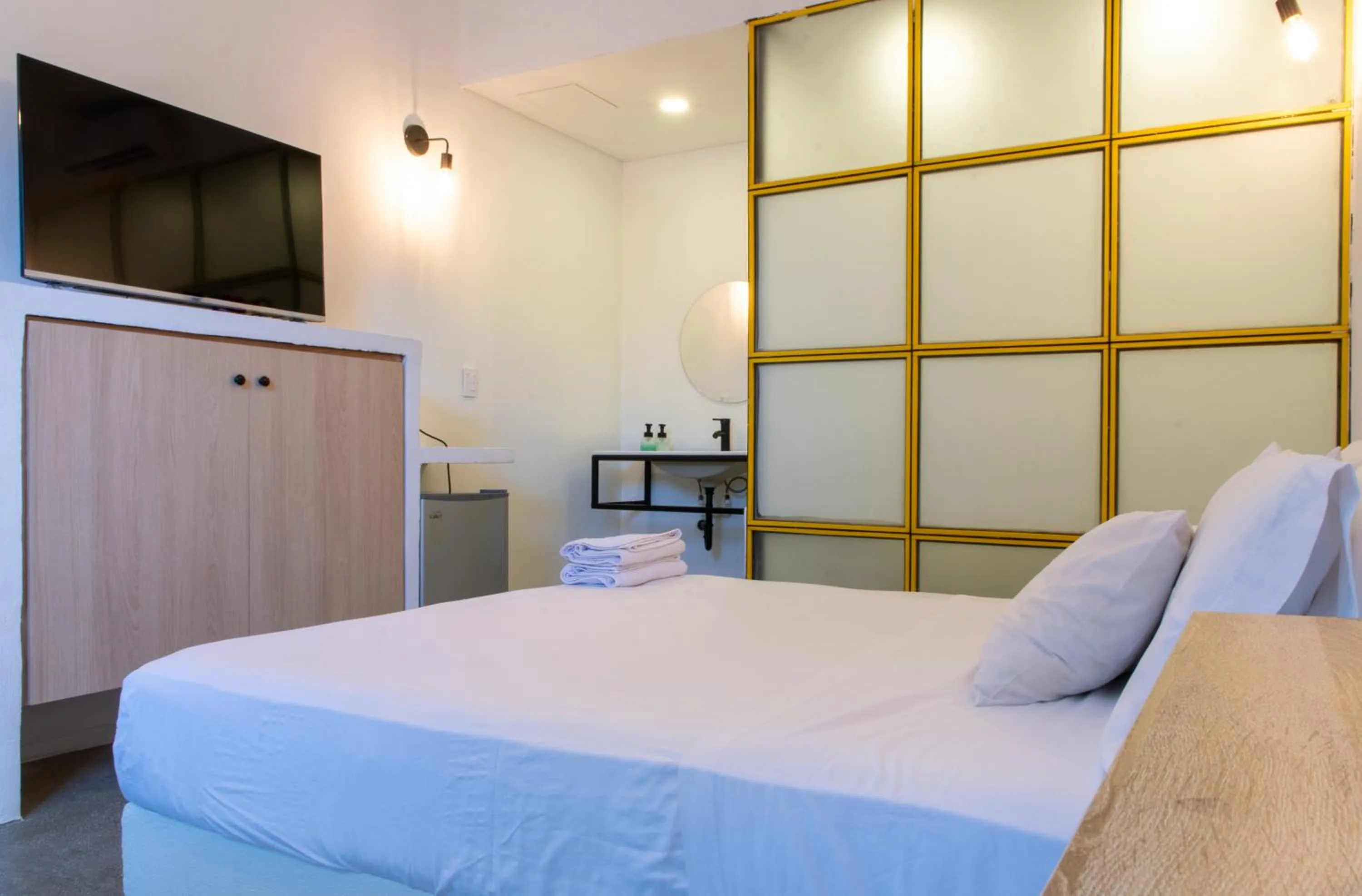 Photo of the whole room, Bed in OASIS TROPICAL HOTEL