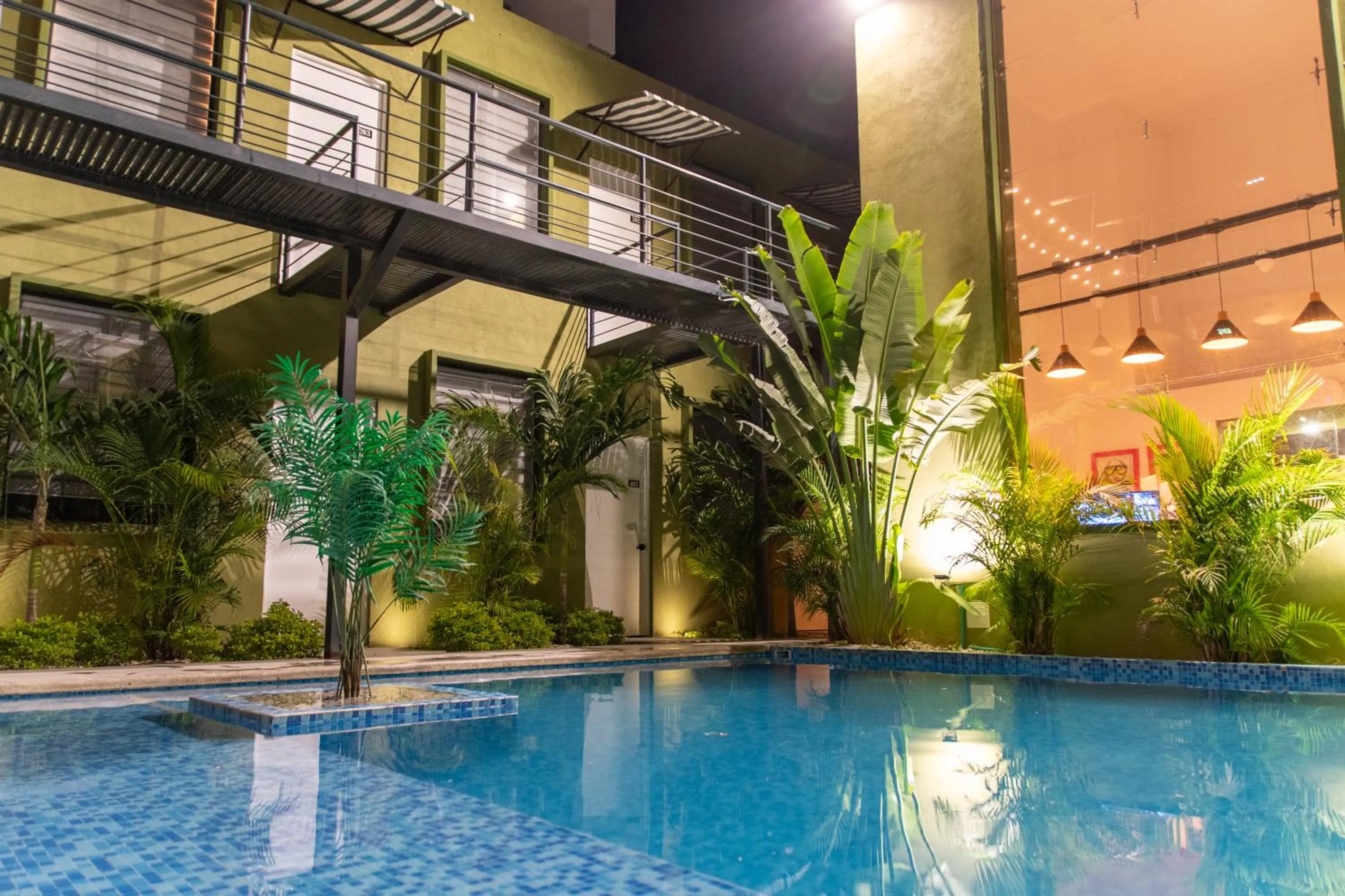 Swimming pool in OASIS TROPICAL HOTEL