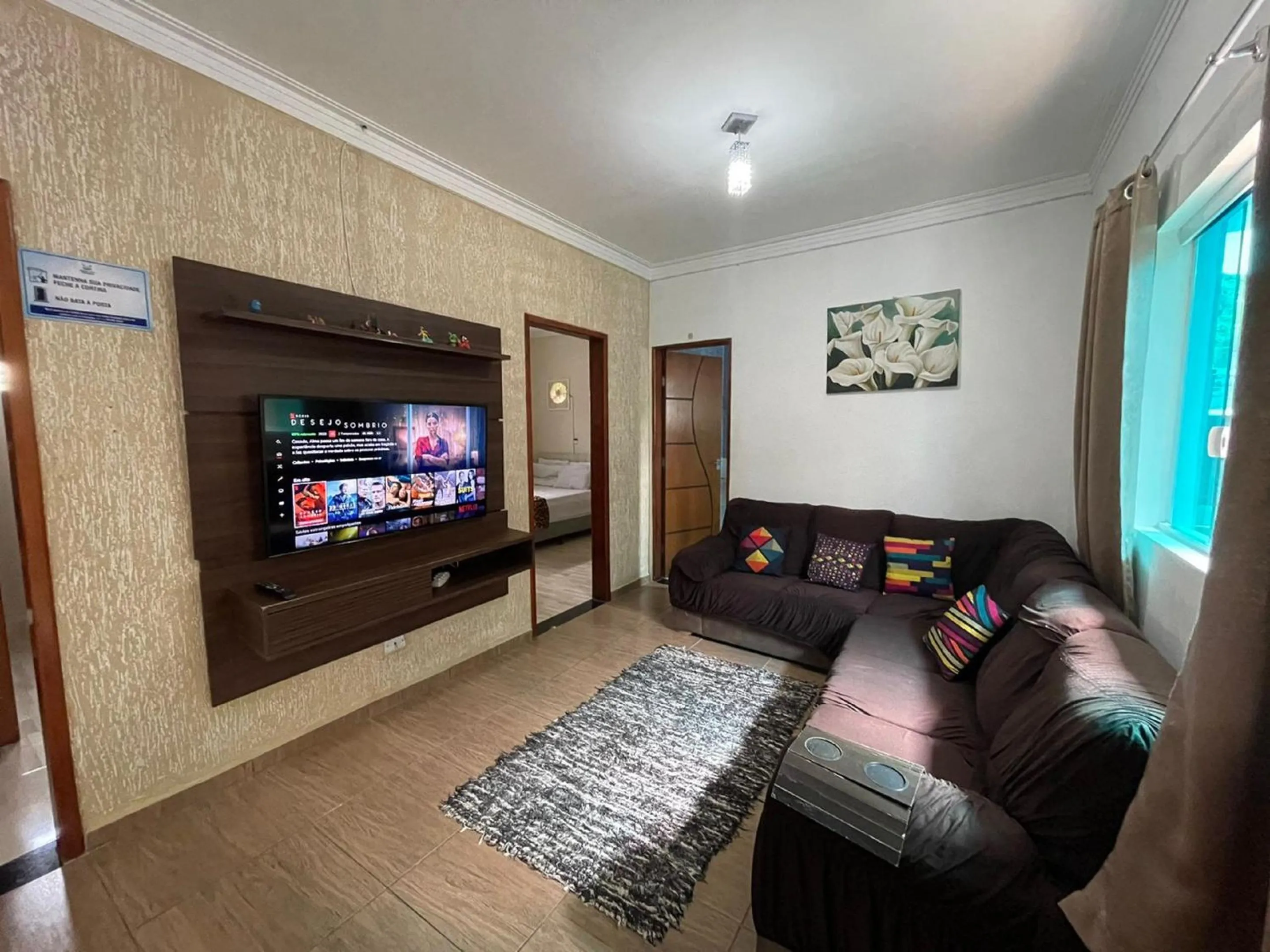 Communal lounge/ TV room in Pousada Ubatuba