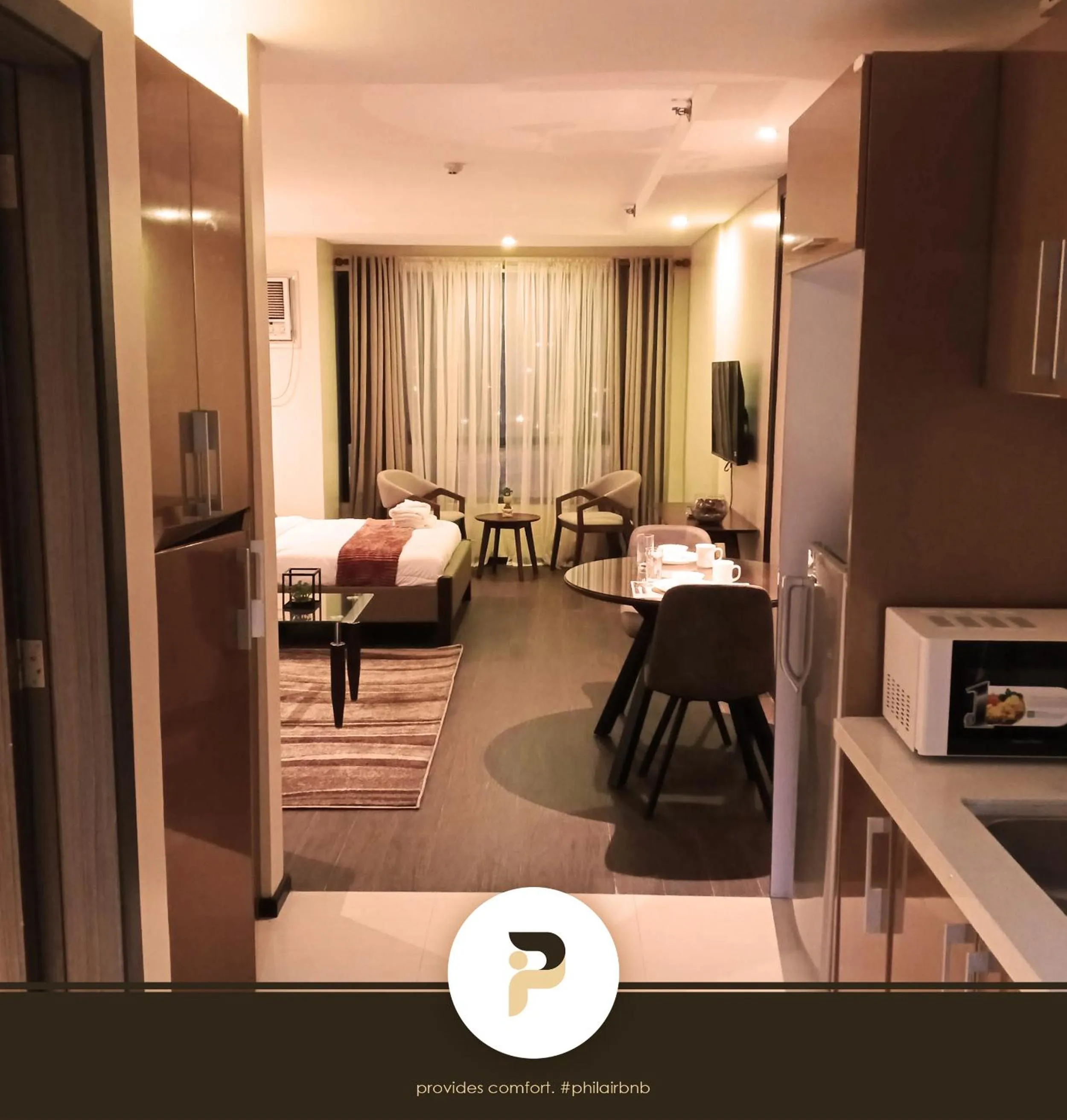 Living room in FULLY FURNISHED STUDIO NEAR MOA