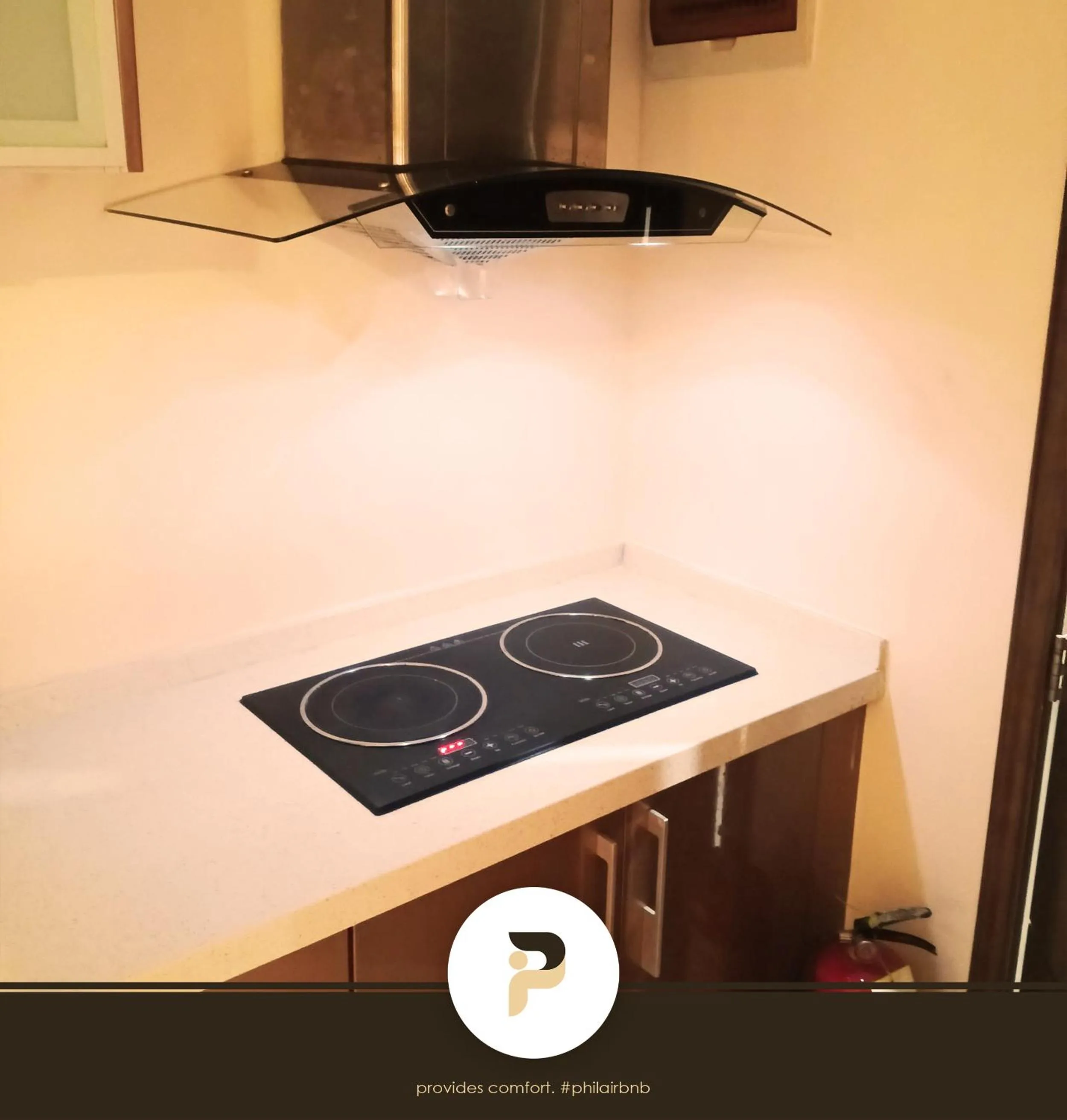 stove in FULLY FURNISHED STUDIO NEAR MOA