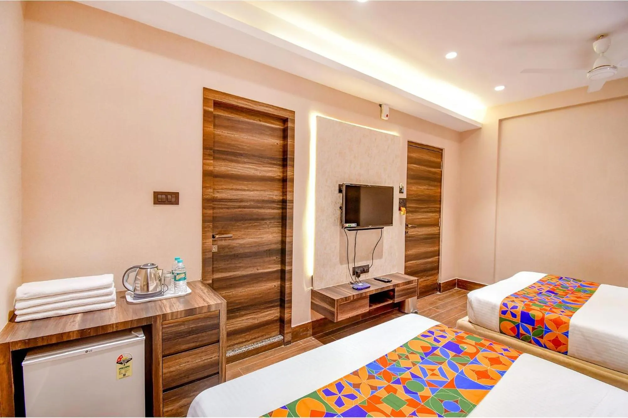 Bed in FabHotel Prime Jalsa - Nr Axis Mall