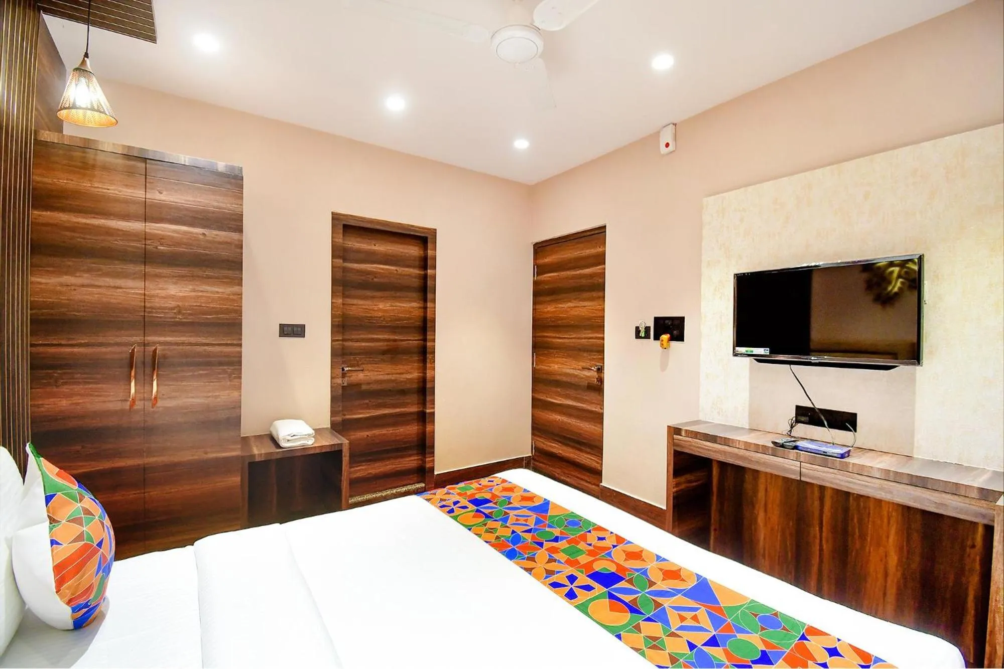 Bed in FabHotel Prime Jalsa - Nr Axis Mall