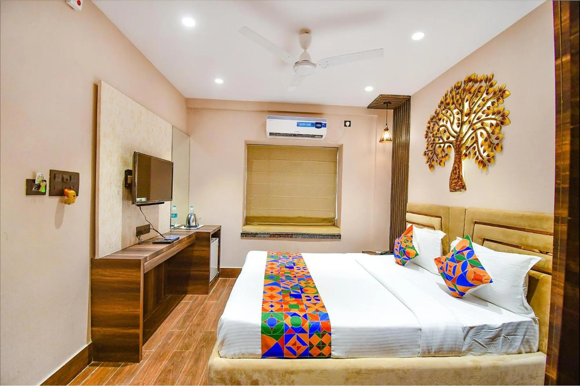 Bed in FabHotel Prime Jalsa - Nr Axis Mall