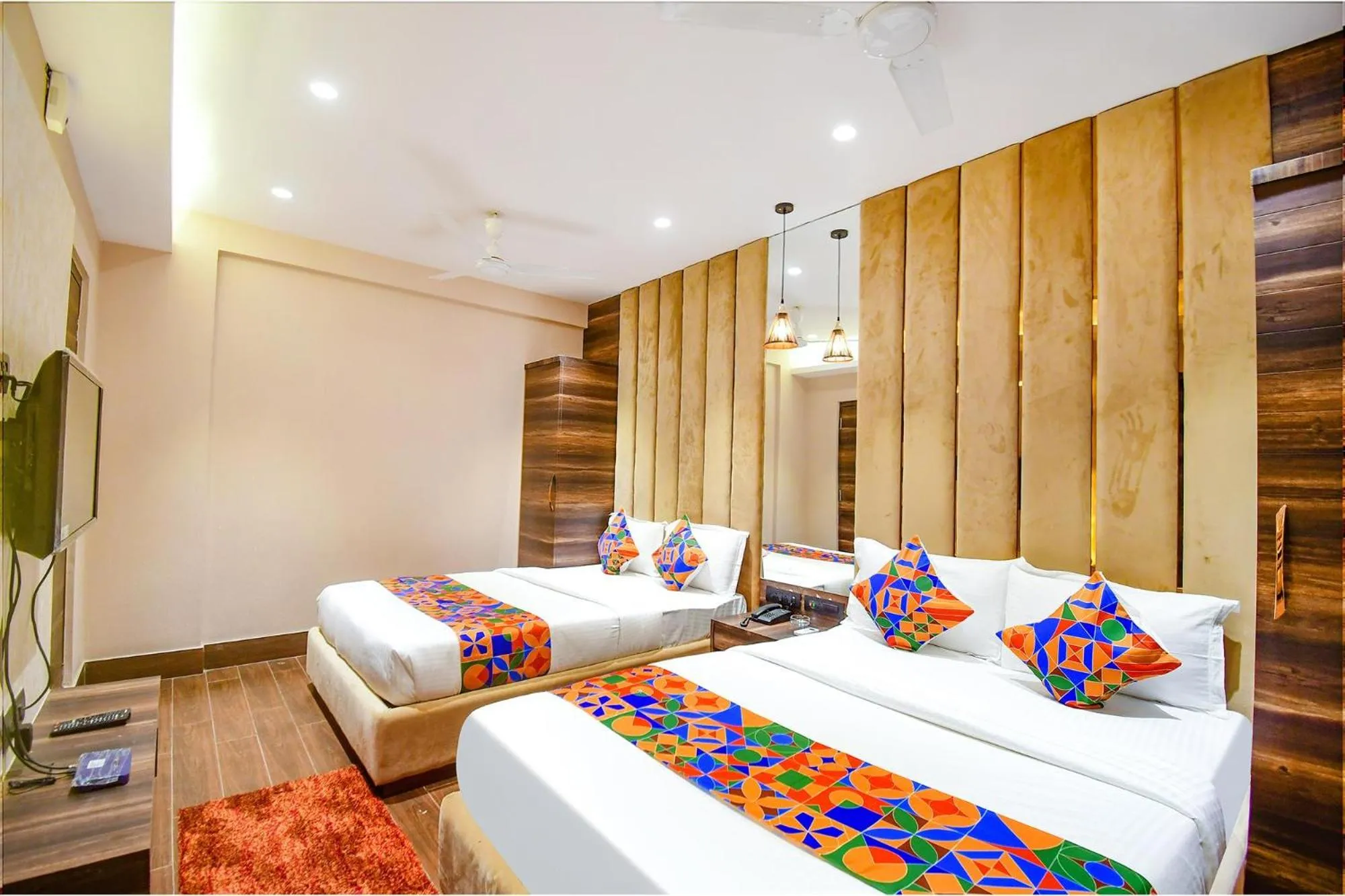 Bed in FabHotel Prime Jalsa - Nr Axis Mall