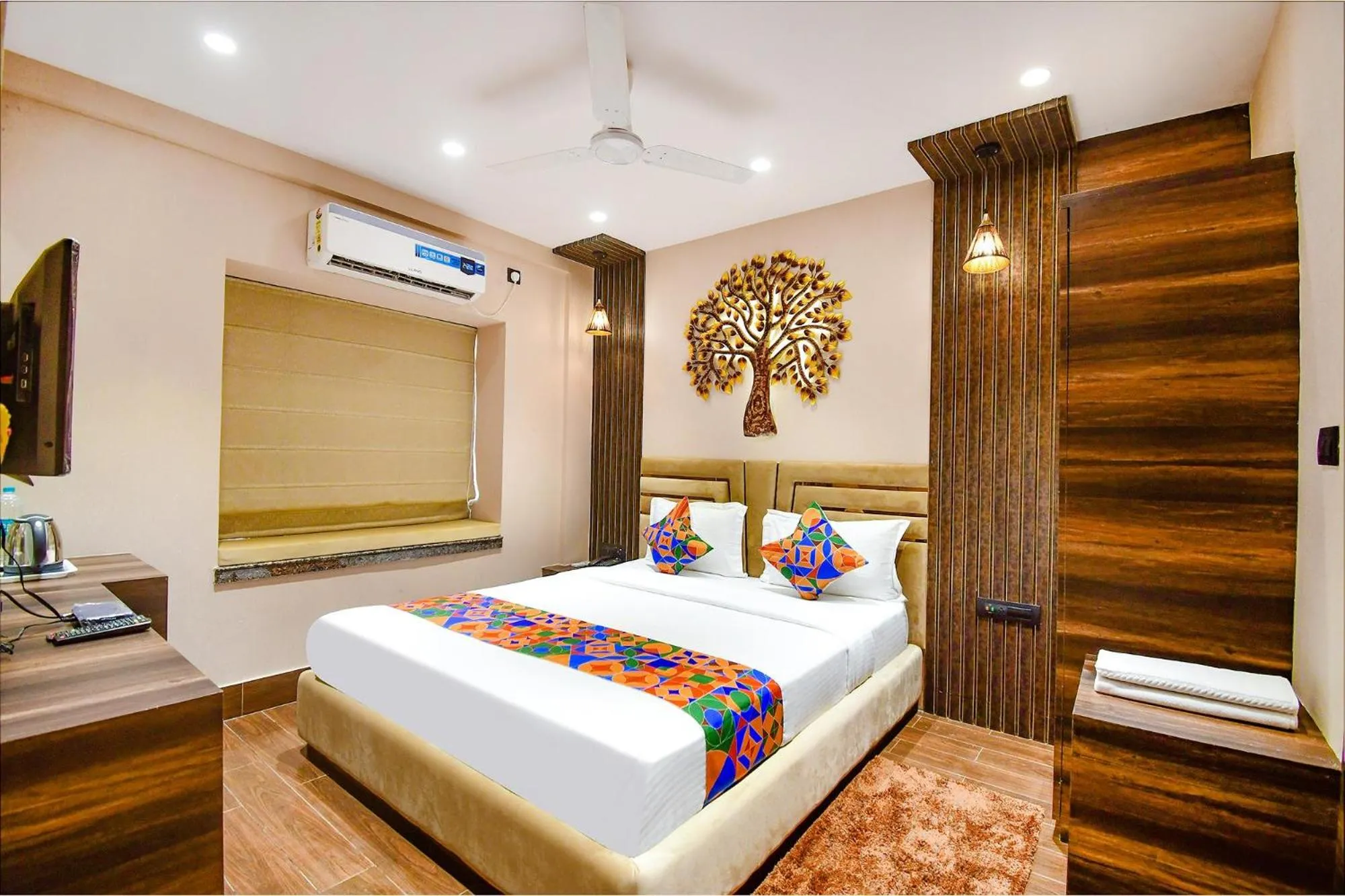 Bed in FabHotel Prime Jalsa - Nr Axis Mall