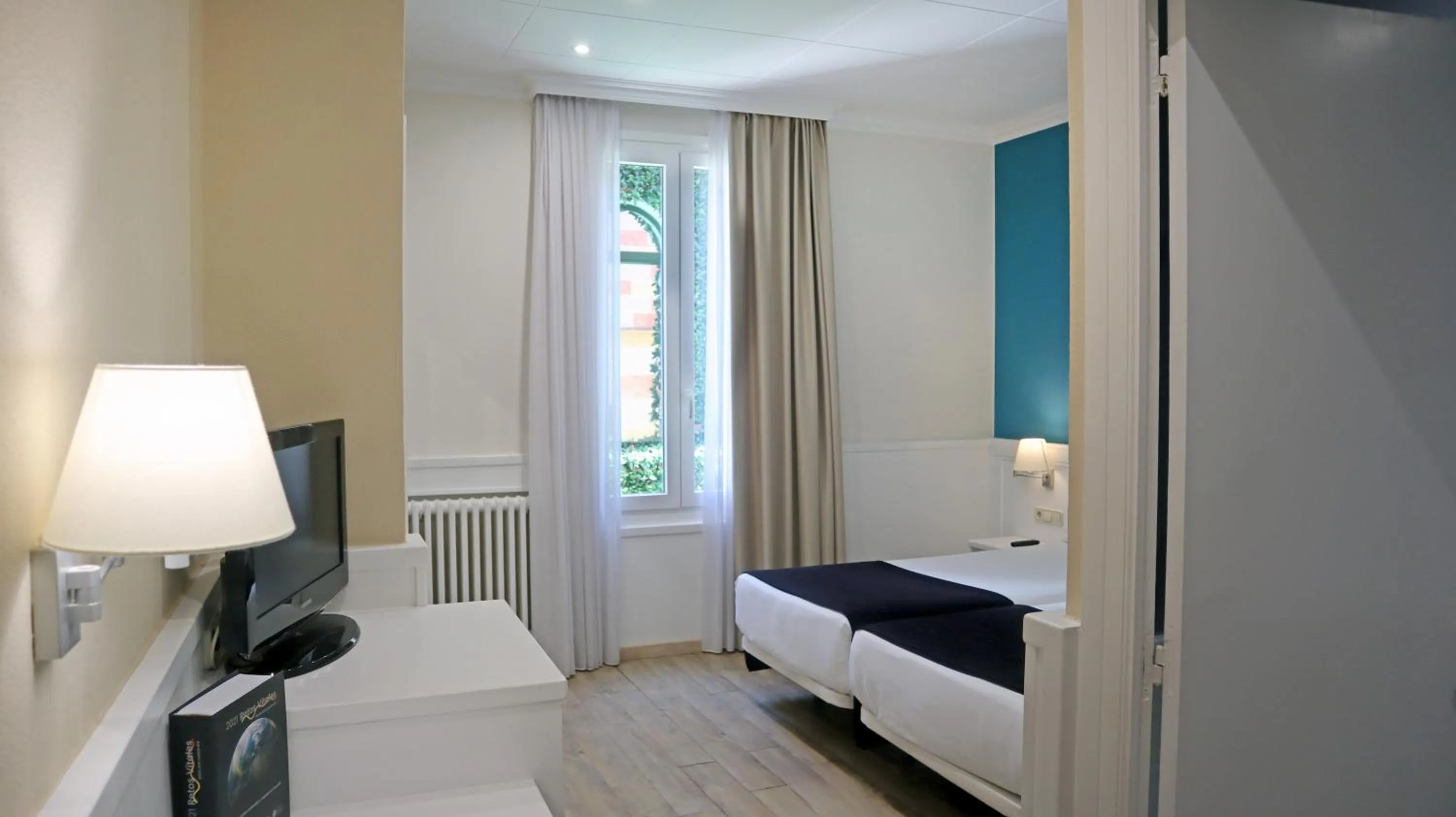 Bed in 1881 Hotel Balneario Vichy Catalan