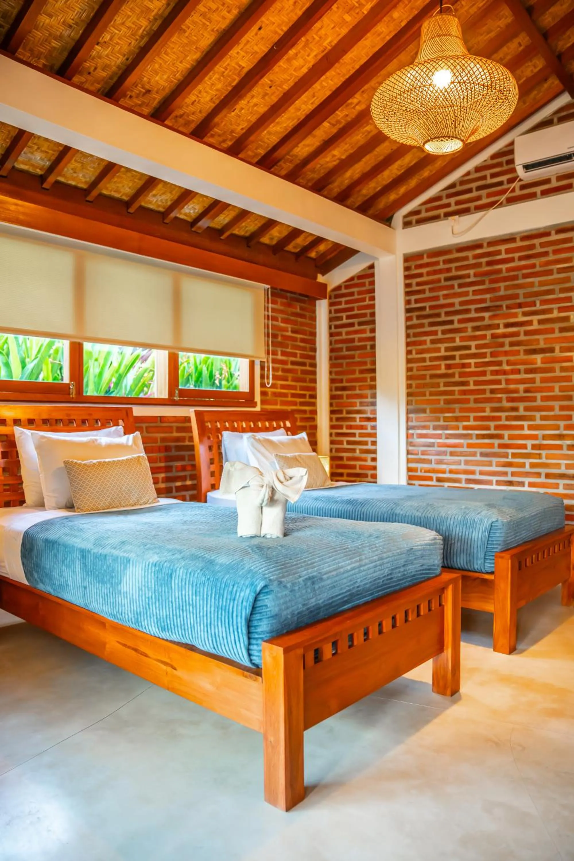 Bed in Kampung Uma Dawa Villas and Spa