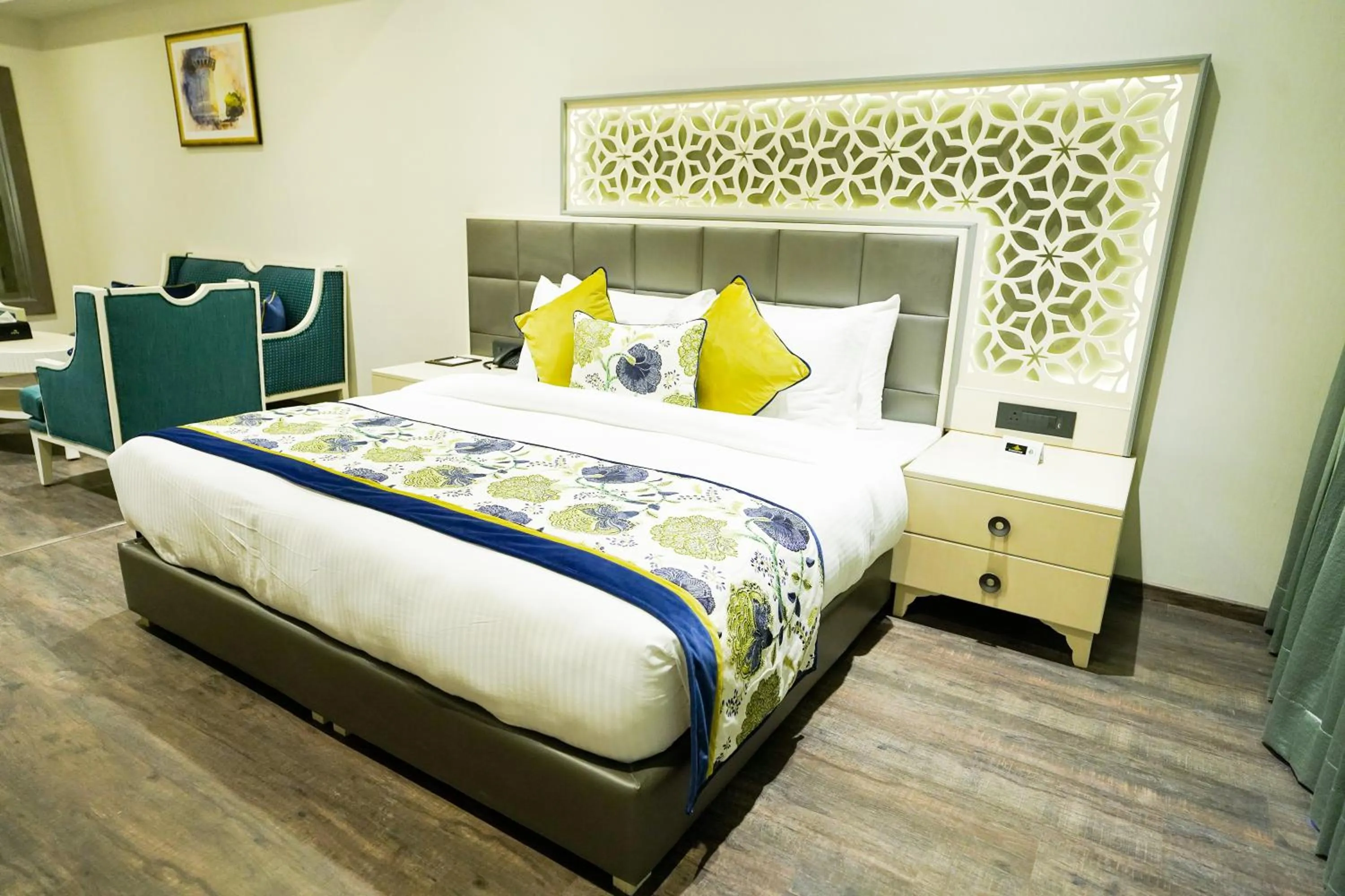 Bed in The Grand Nirvana Hotel