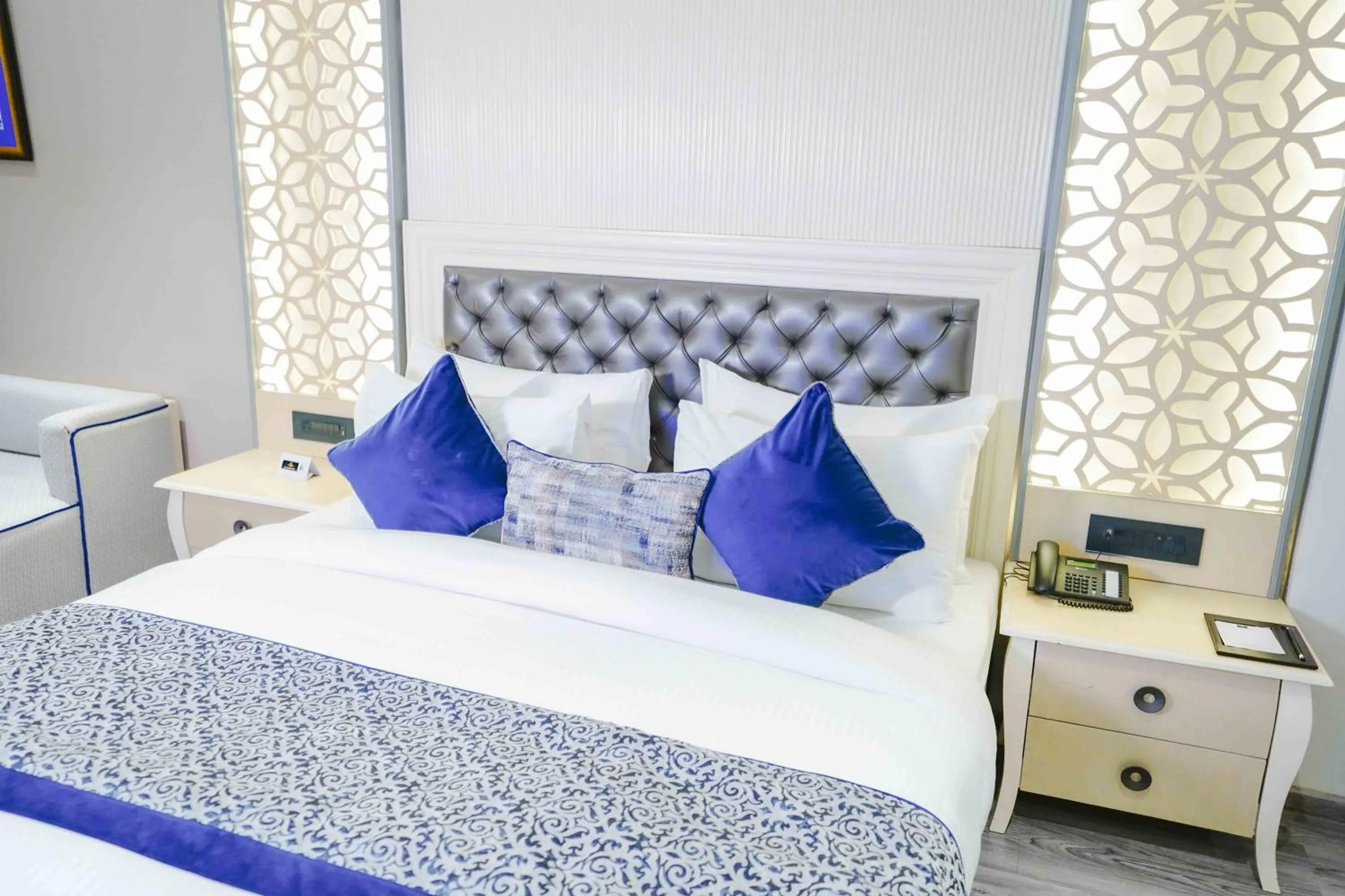 Bed in The Grand Nirvana Hotel