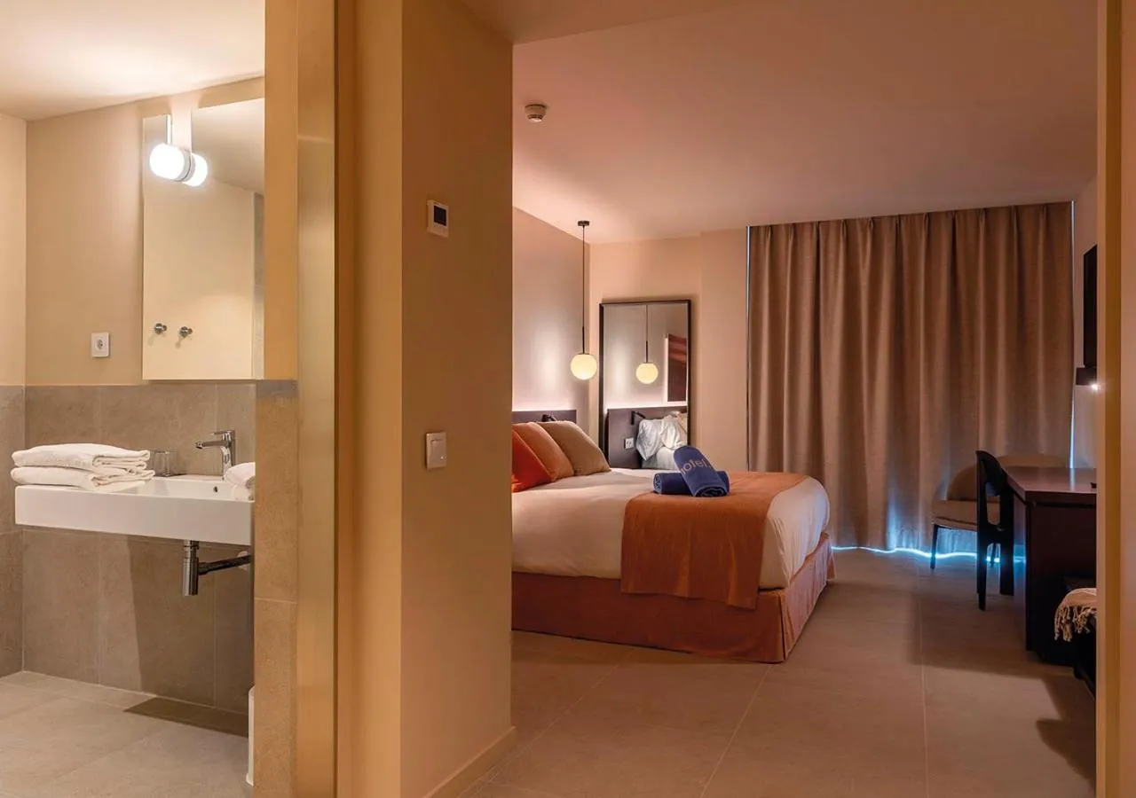 Photo of the whole room, Bed in AQUA Hotel Promenade & Spa 4Sup