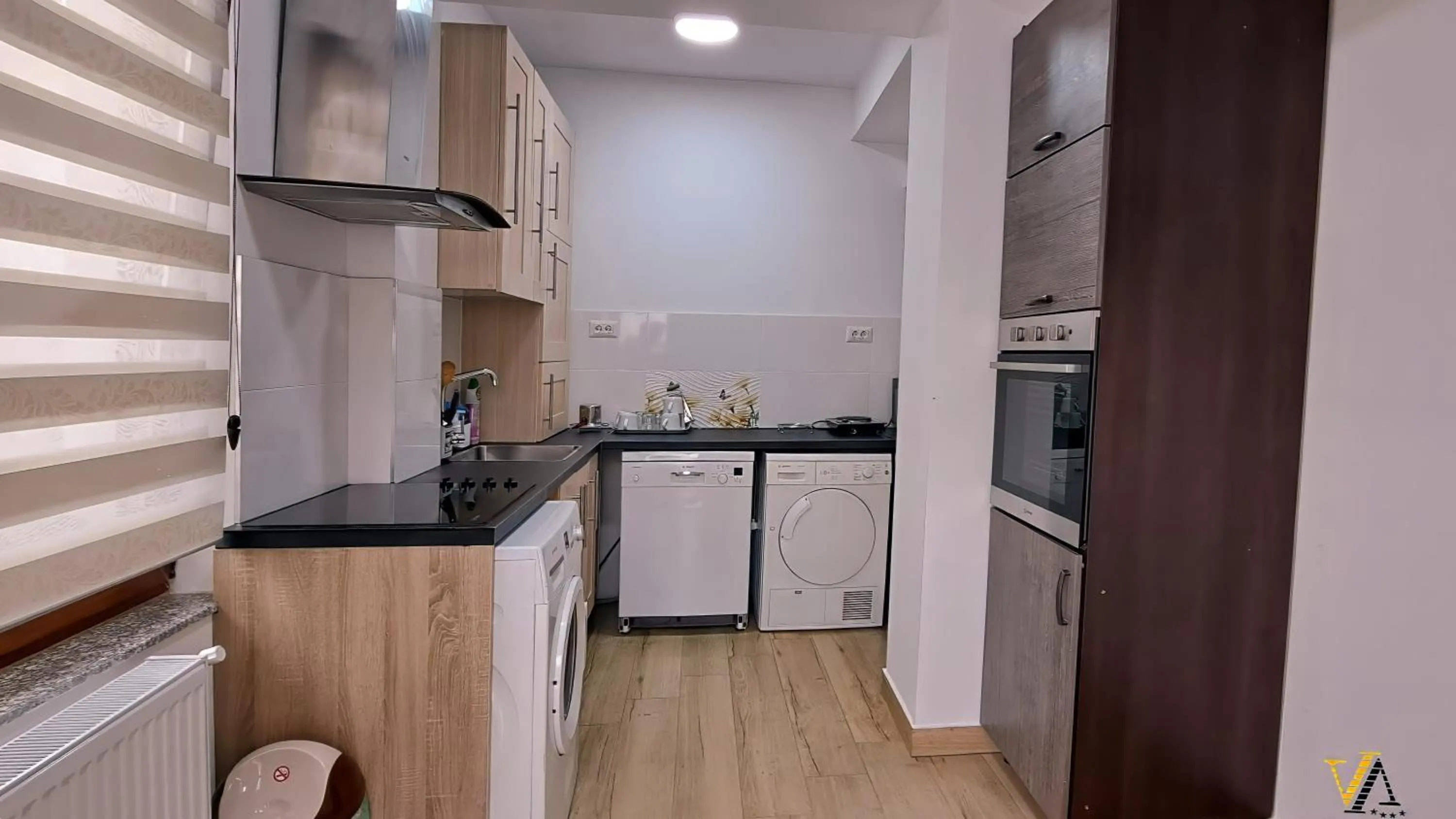 Communal kitchen in VAiAs Aparts