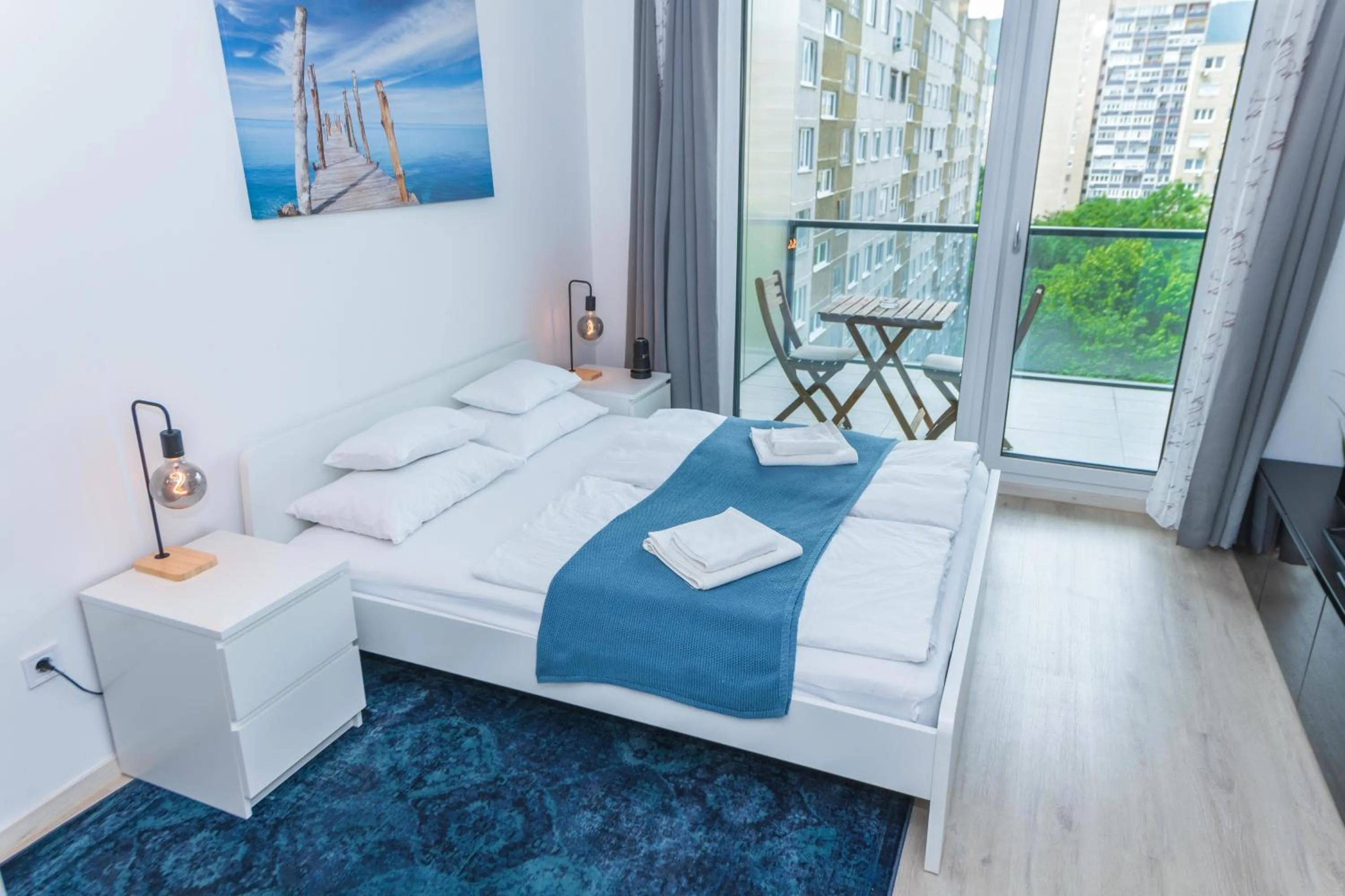 Bed in WaterFront City Apartments by FirstHost