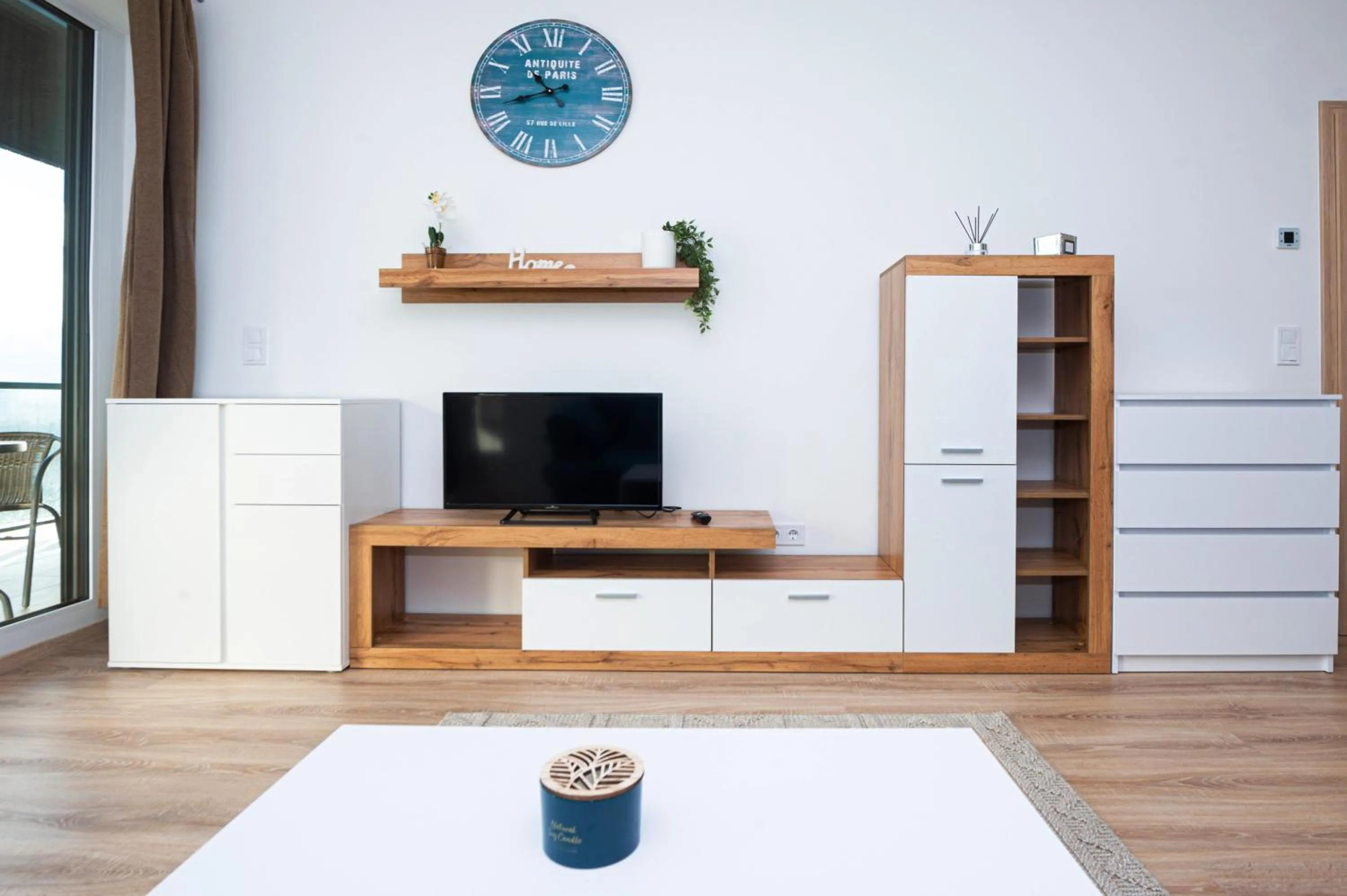 Communal lounge/ TV room in WaterFront City Apartments by FirstHost