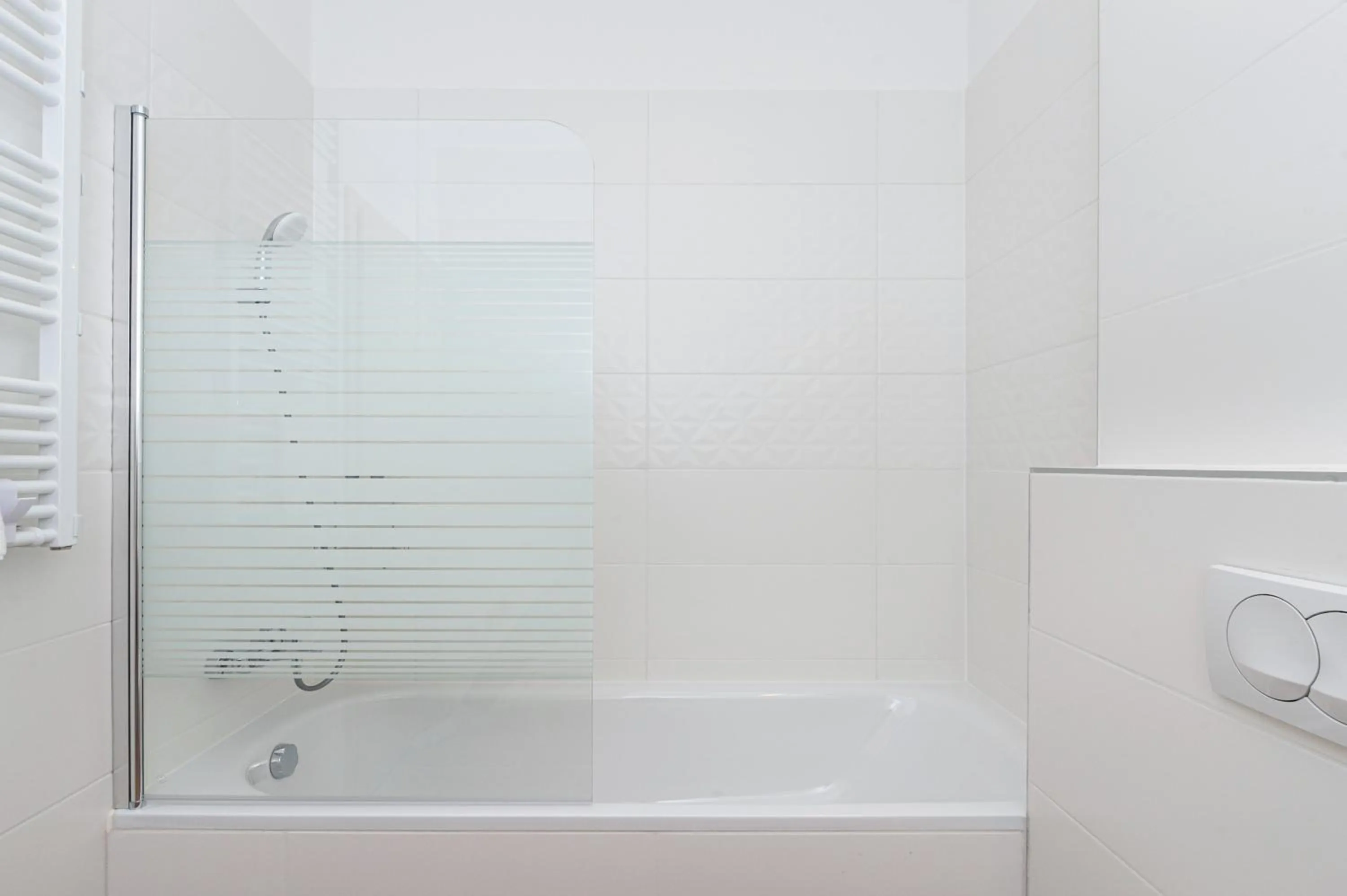 Shower in WaterFront City Apartments by FirstHost