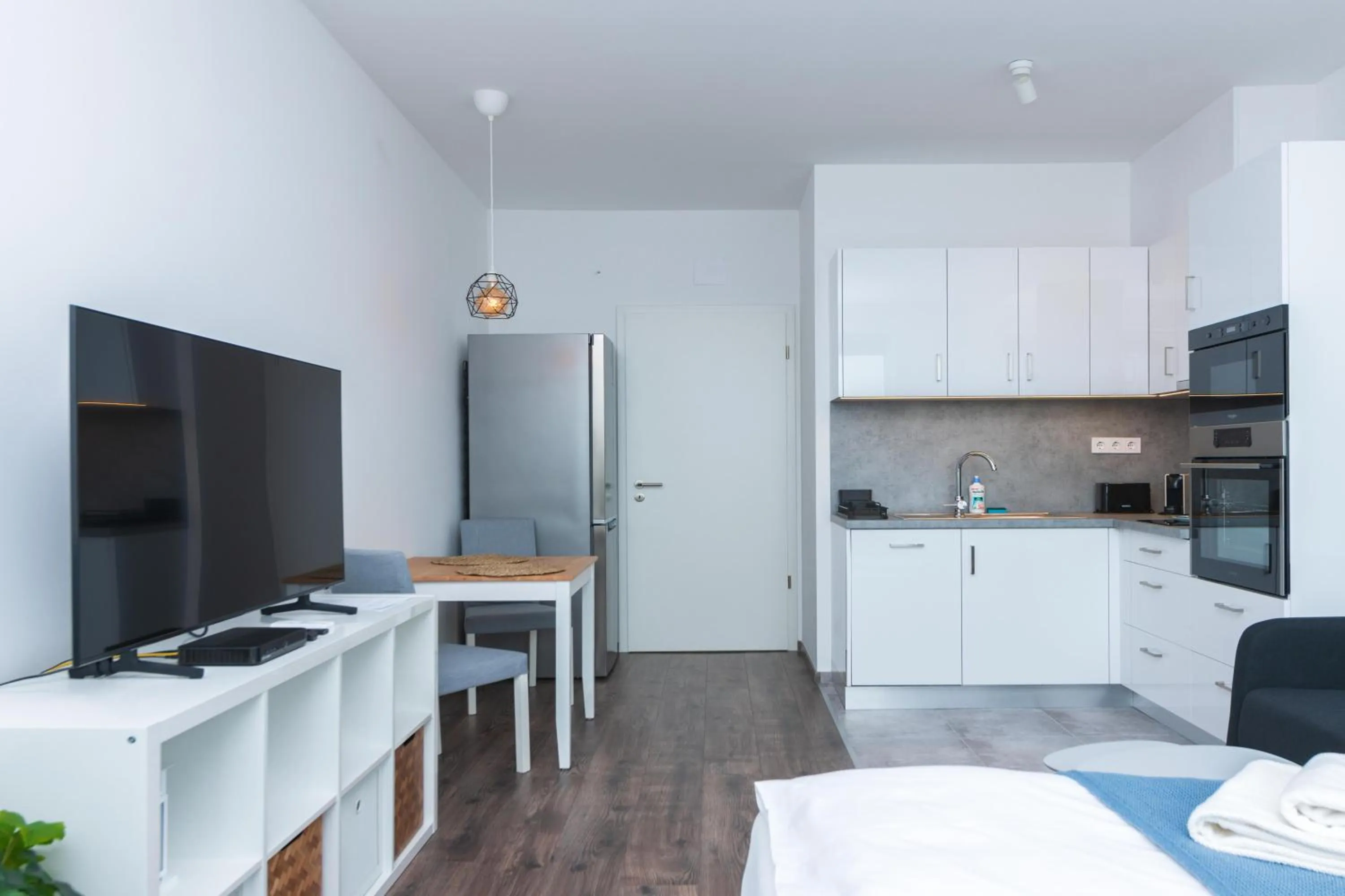 Bed in WaterFront City Apartments by FirstHost