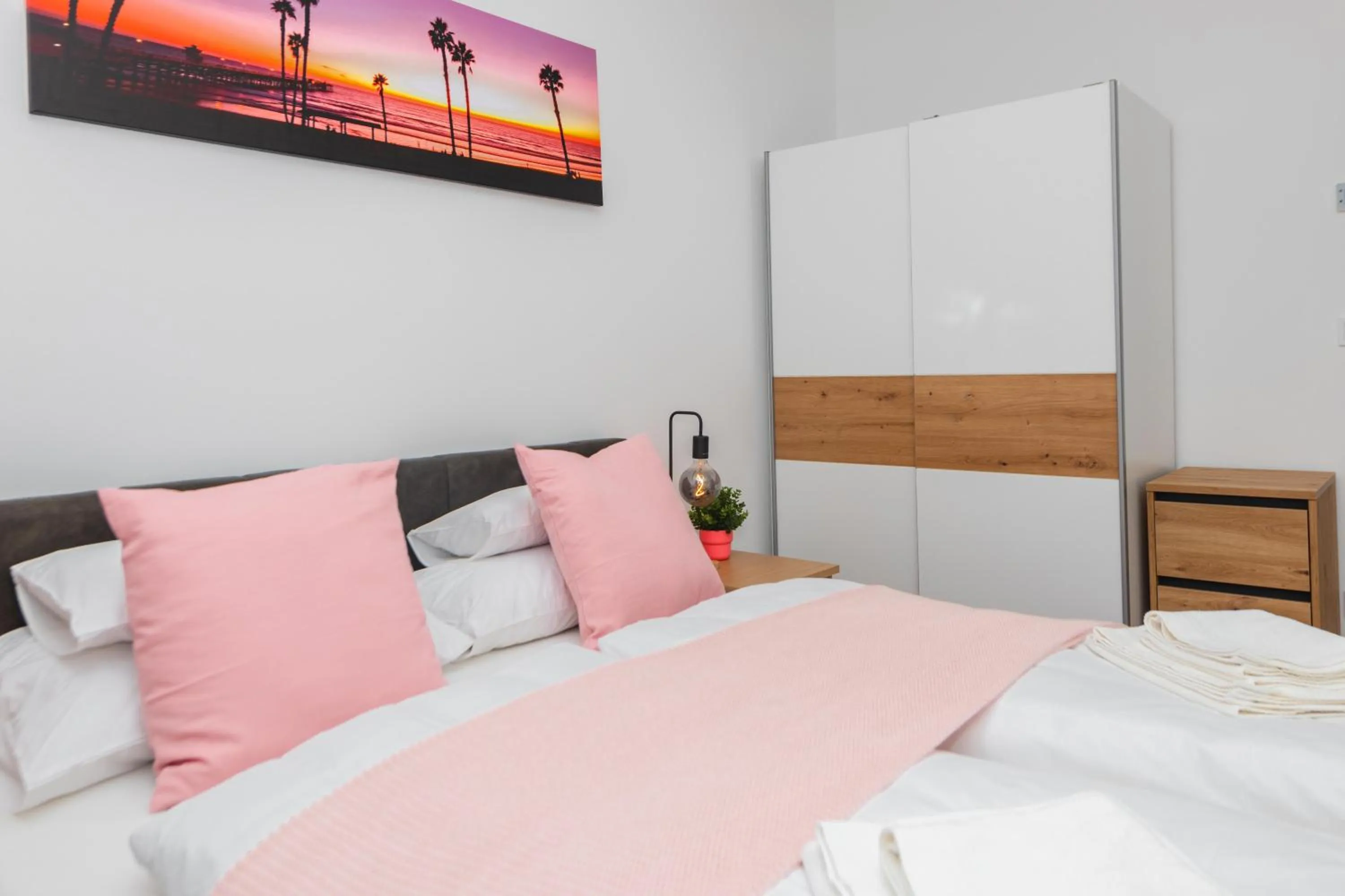 Bed in WaterFront City Apartments by FirstHost