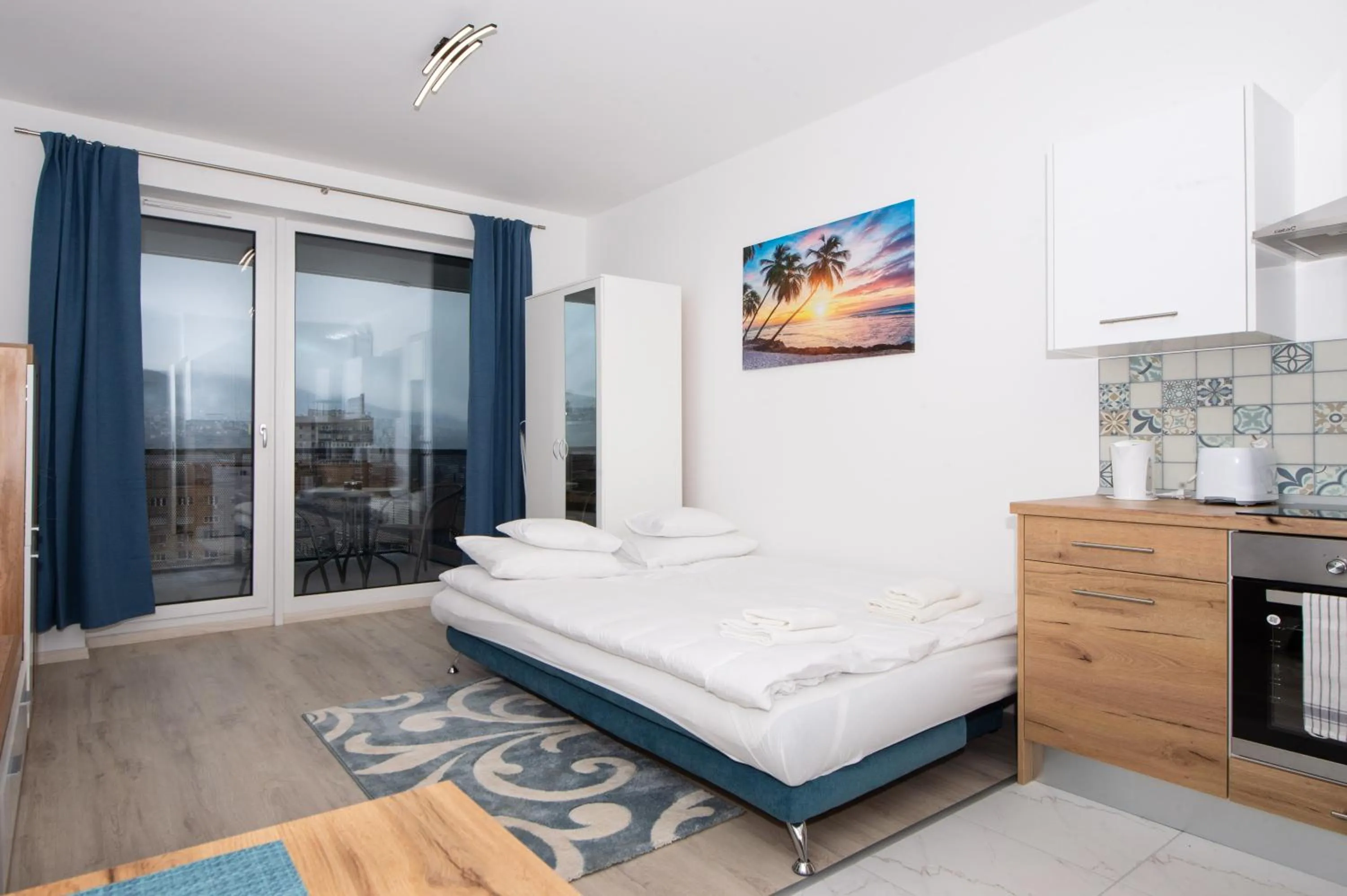 Bed in WaterFront City Apartments by FirstHost
