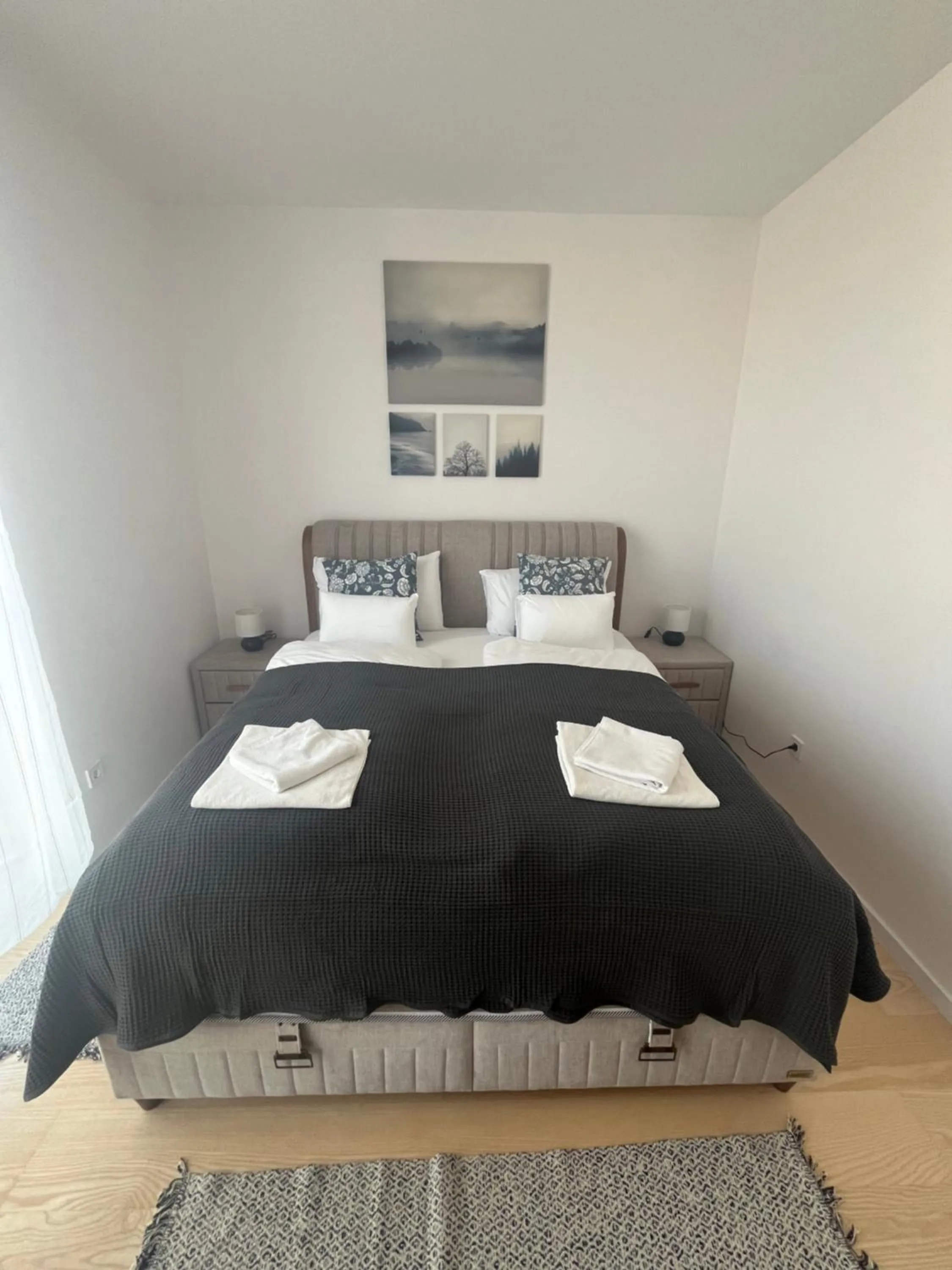 Bed in WaterFront City Apartments by FirstHost