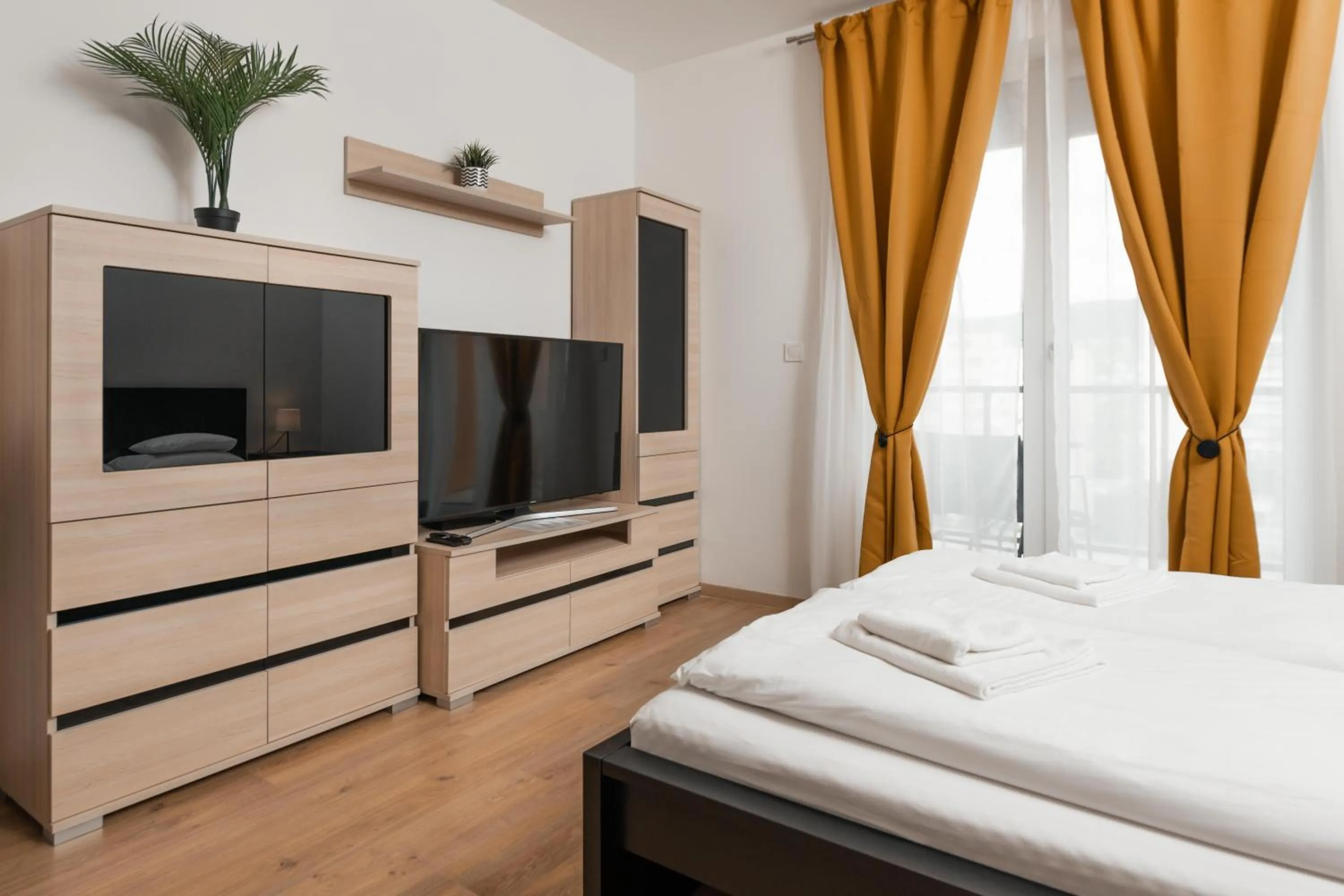 Bed in WaterFront City Apartments by FirstHost