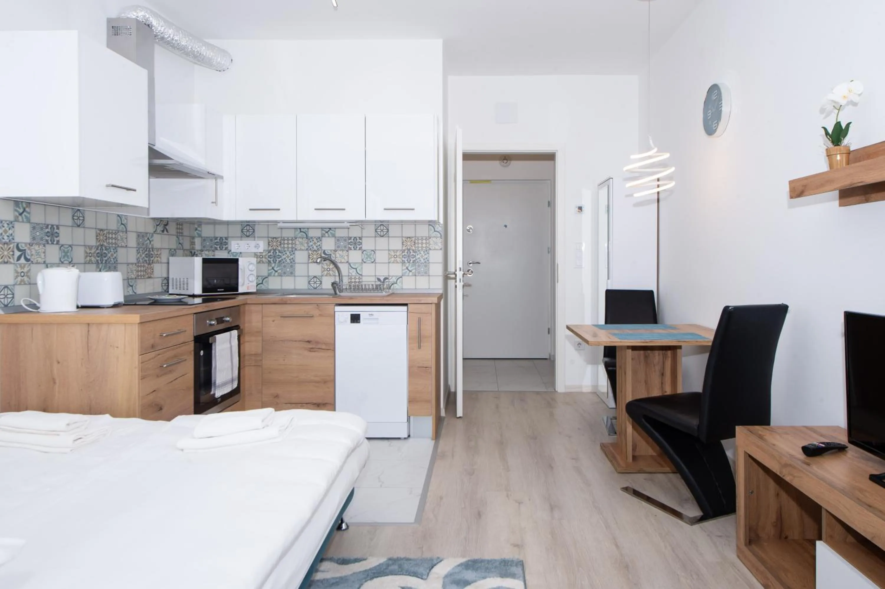 Bed in WaterFront City Apartments by FirstHost