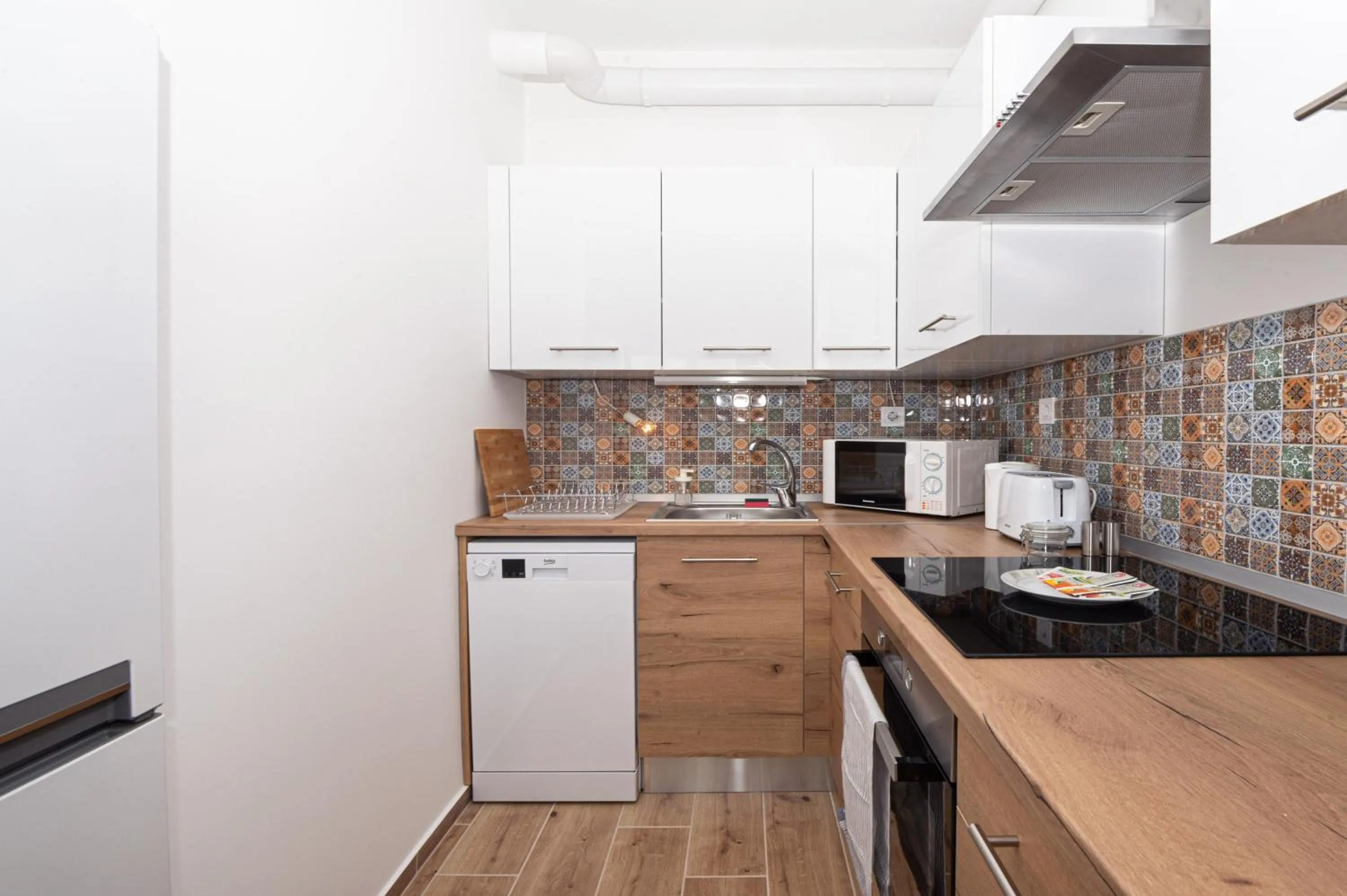 Coffee/tea facilities in WaterFront City Apartments by FirstHost