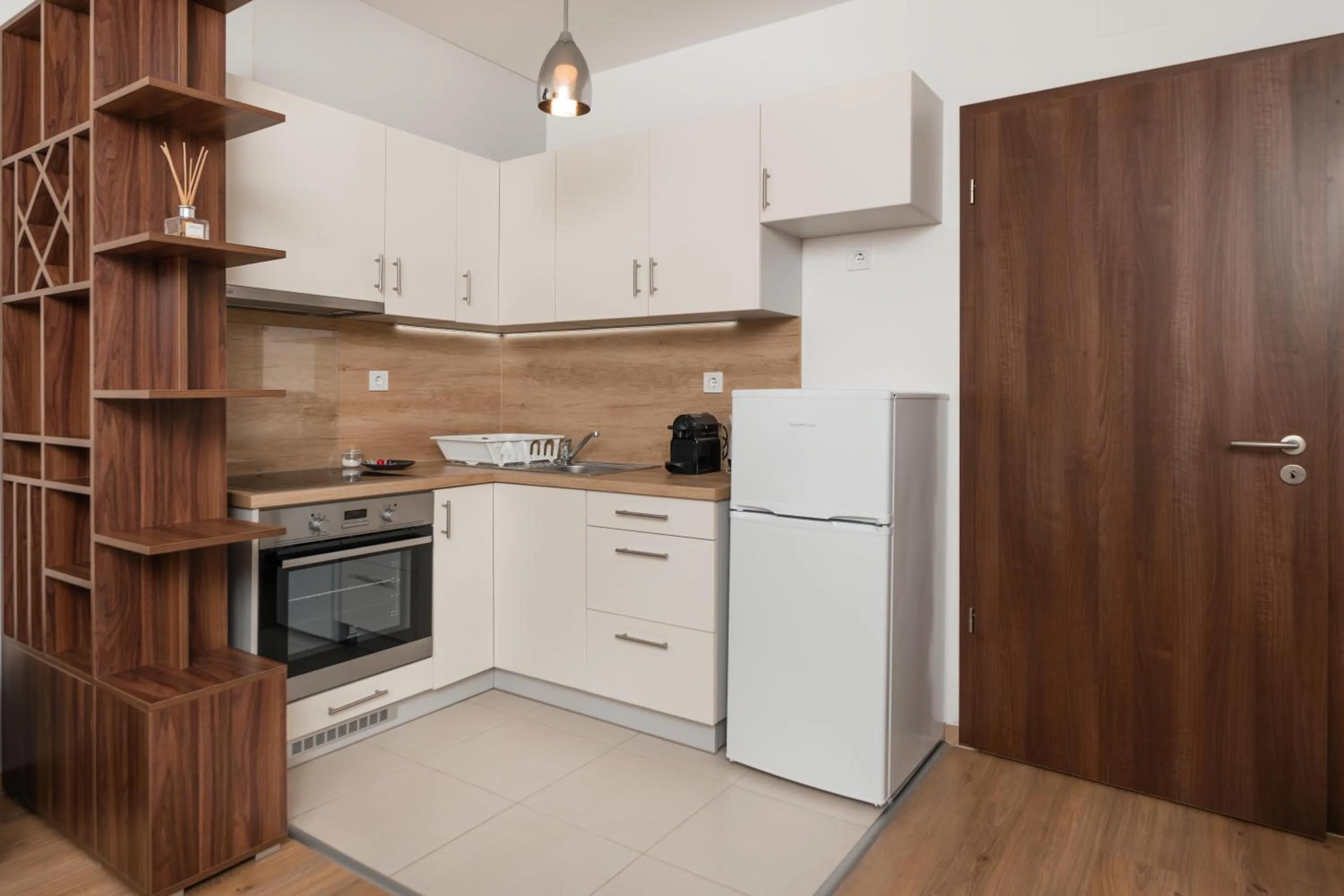 Coffee/tea facilities in WaterFront City Apartments by FirstHost