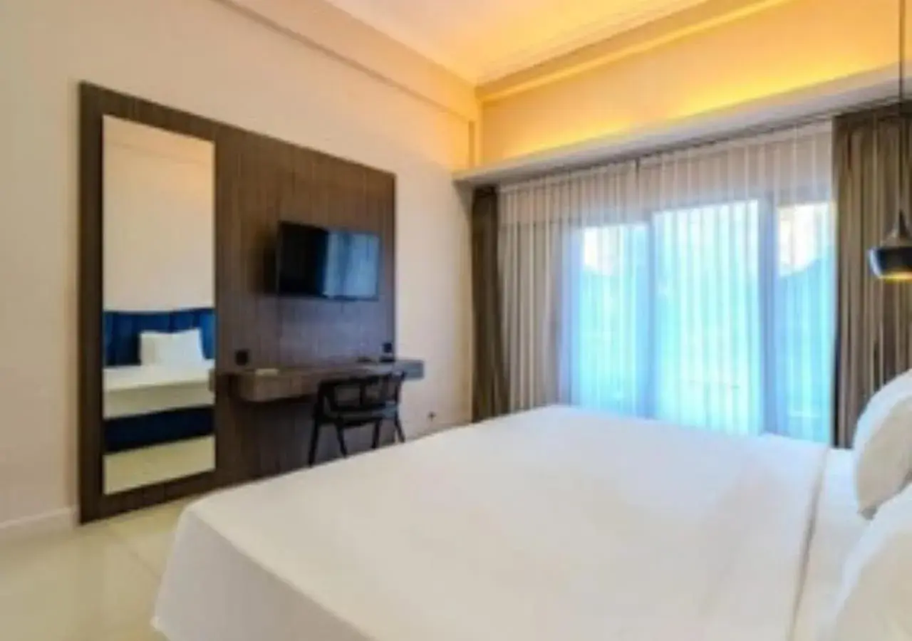 Communal lounge/ TV room, Bed in Marine Bay Sanur Communal lounge/ TV room, Bed in Marine Bay Sanur