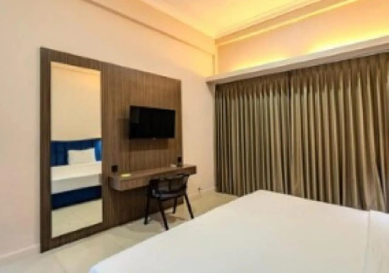 Communal lounge/ TV room, Bed in Marine Bay Sanur