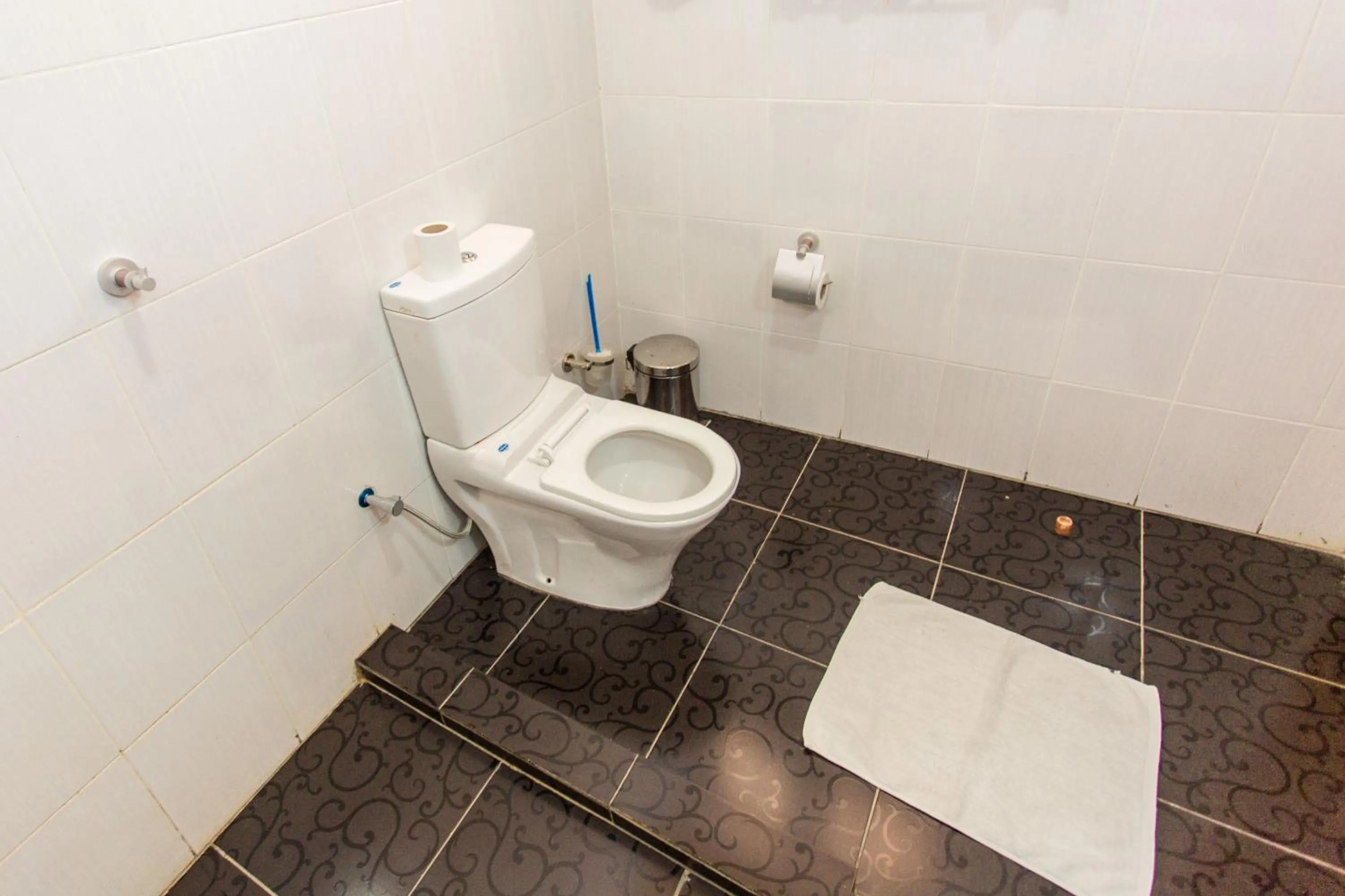 Toilet in Nirvana Heights Hotel