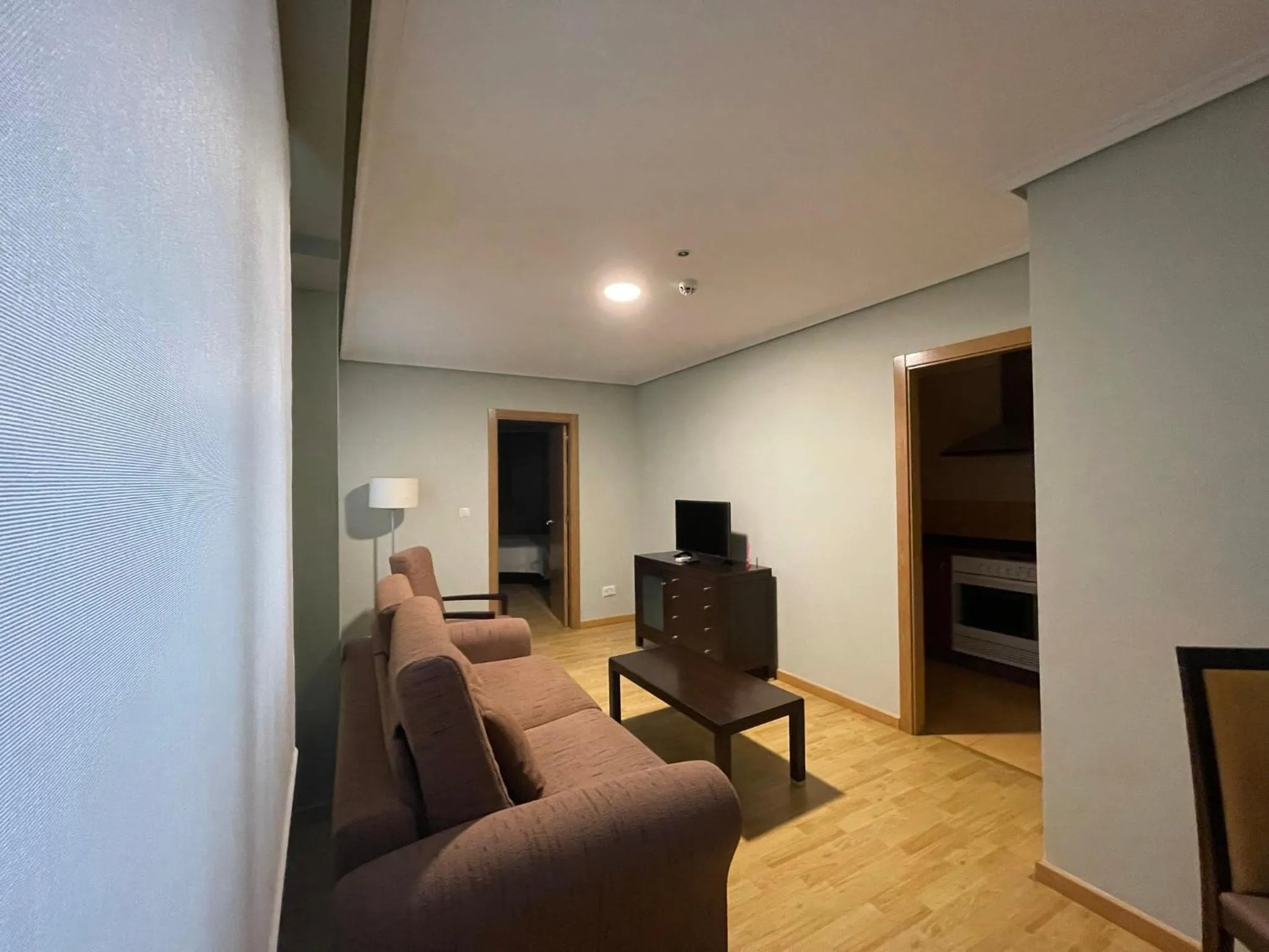 Living room in Aparthotel Arenteiro