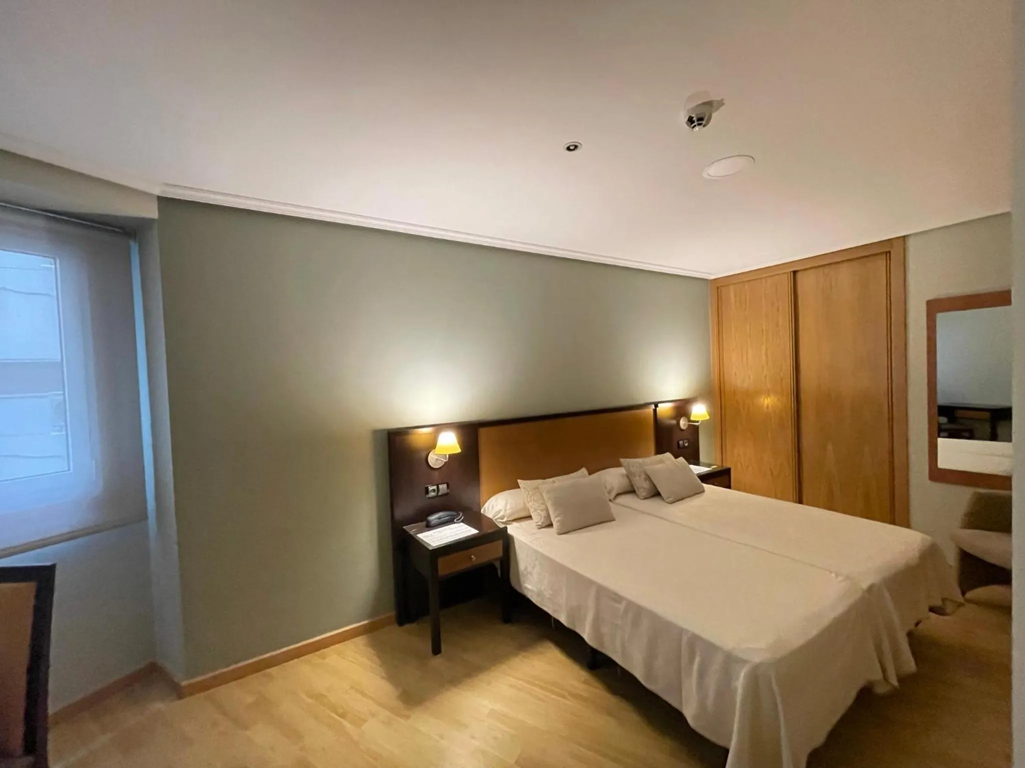 Bed in Aparthotel Arenteiro