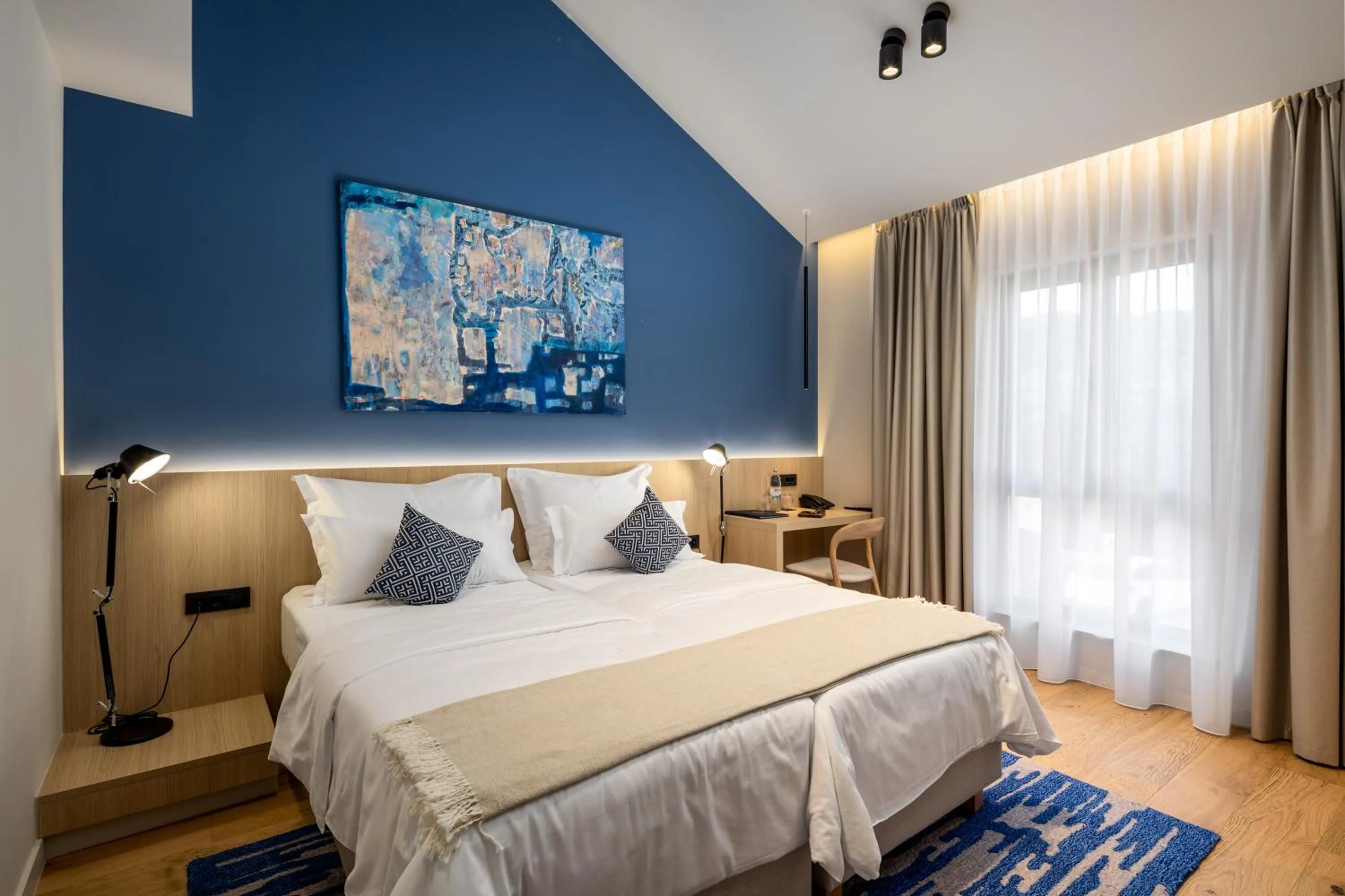 Bed in Emotheo Heritage Hotel