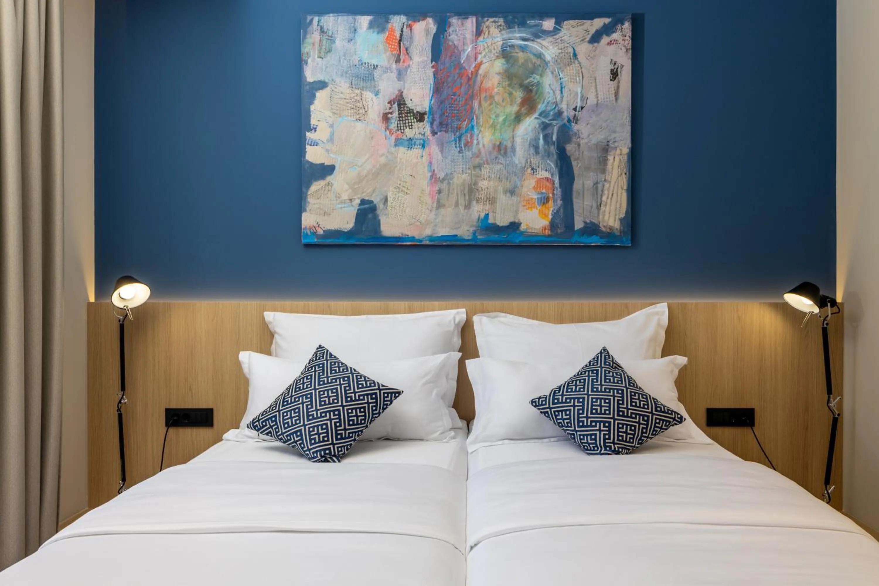 Bed in Emotheo Heritage Hotel