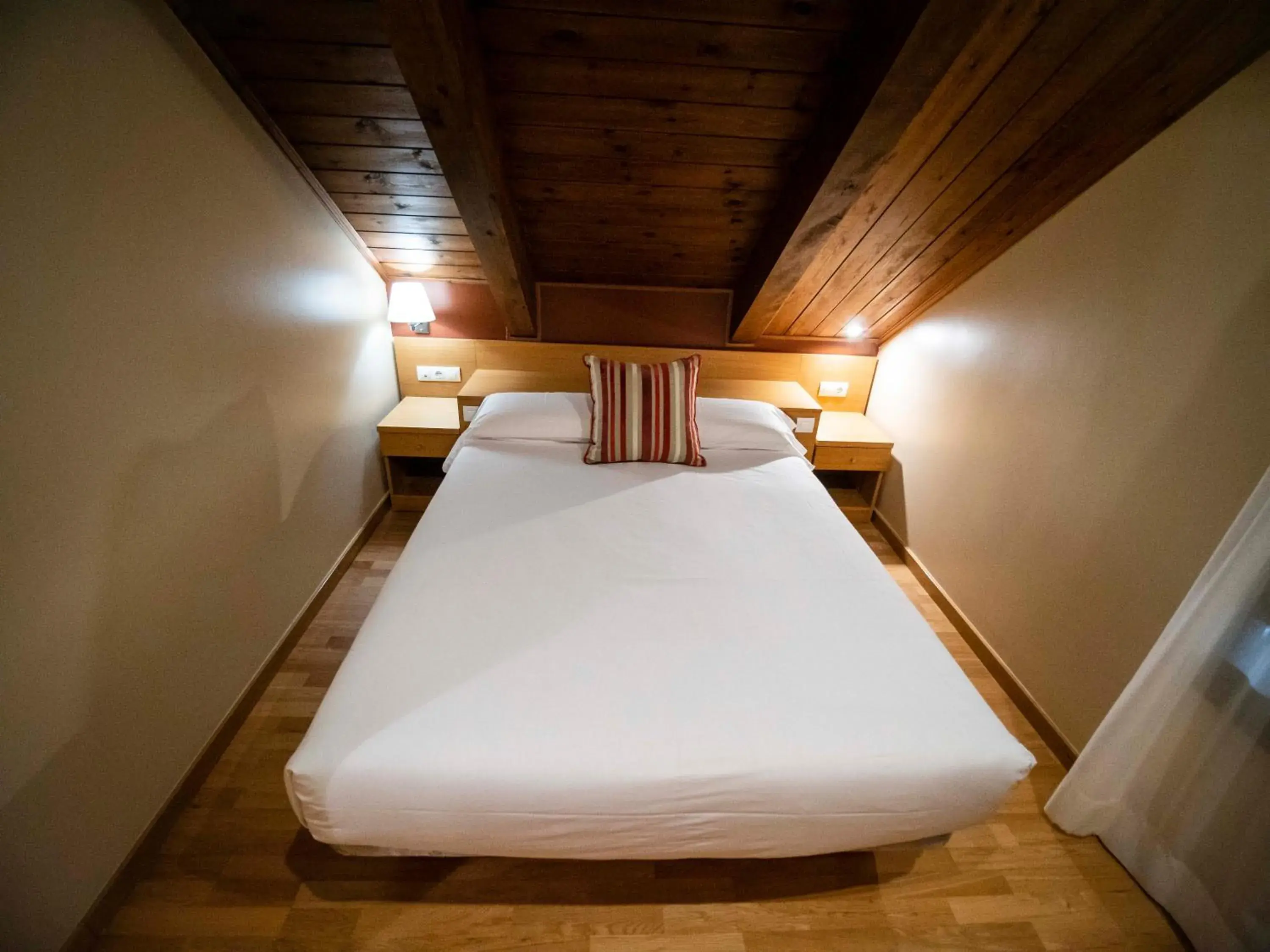 Property building, Bed in Aparthotel Siente Boí & SPA Property building, Bed in Aparthotel Siente Boí & SPA