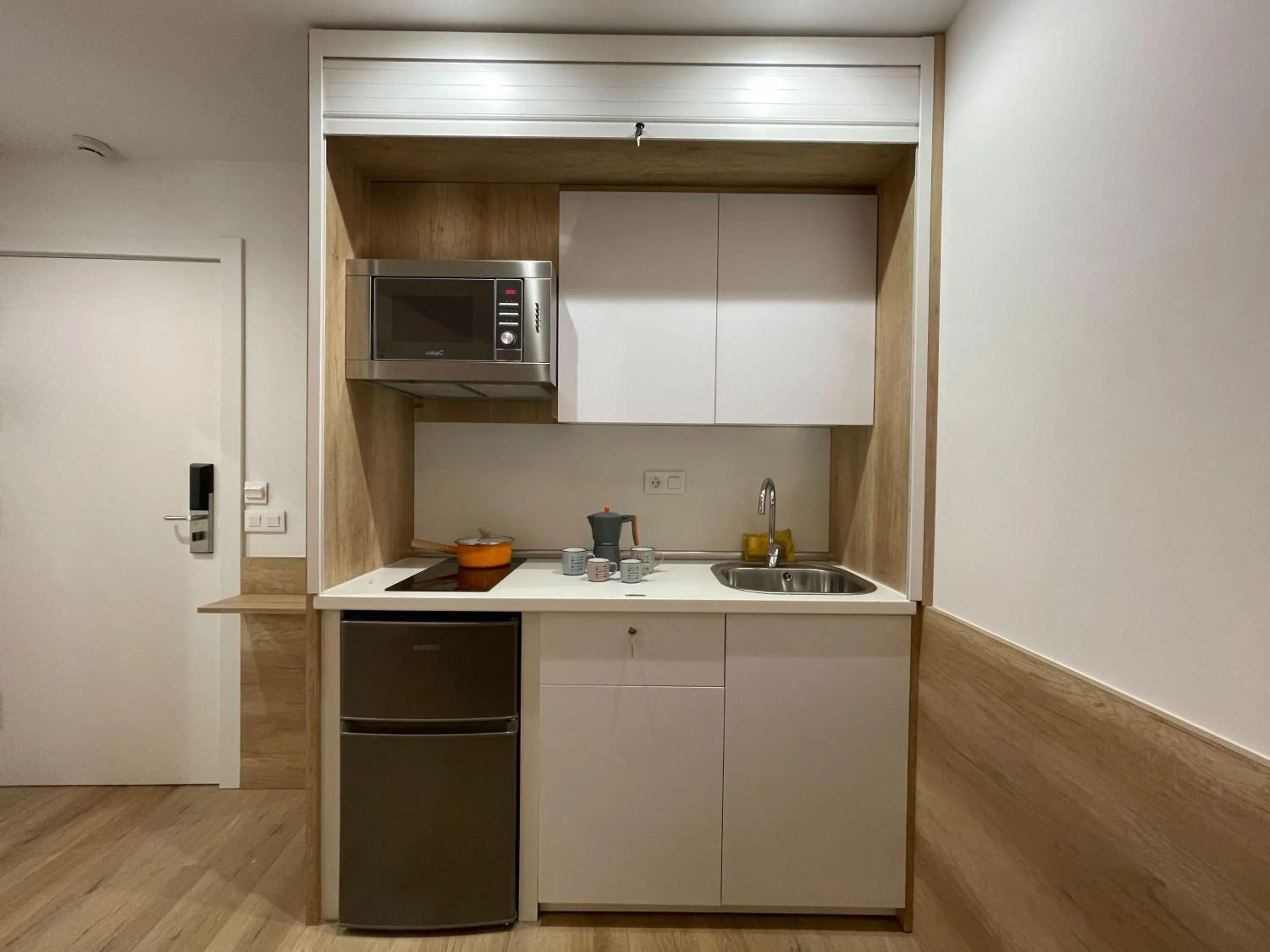 Kitchen or kitchenette in Apartamentos La Solana