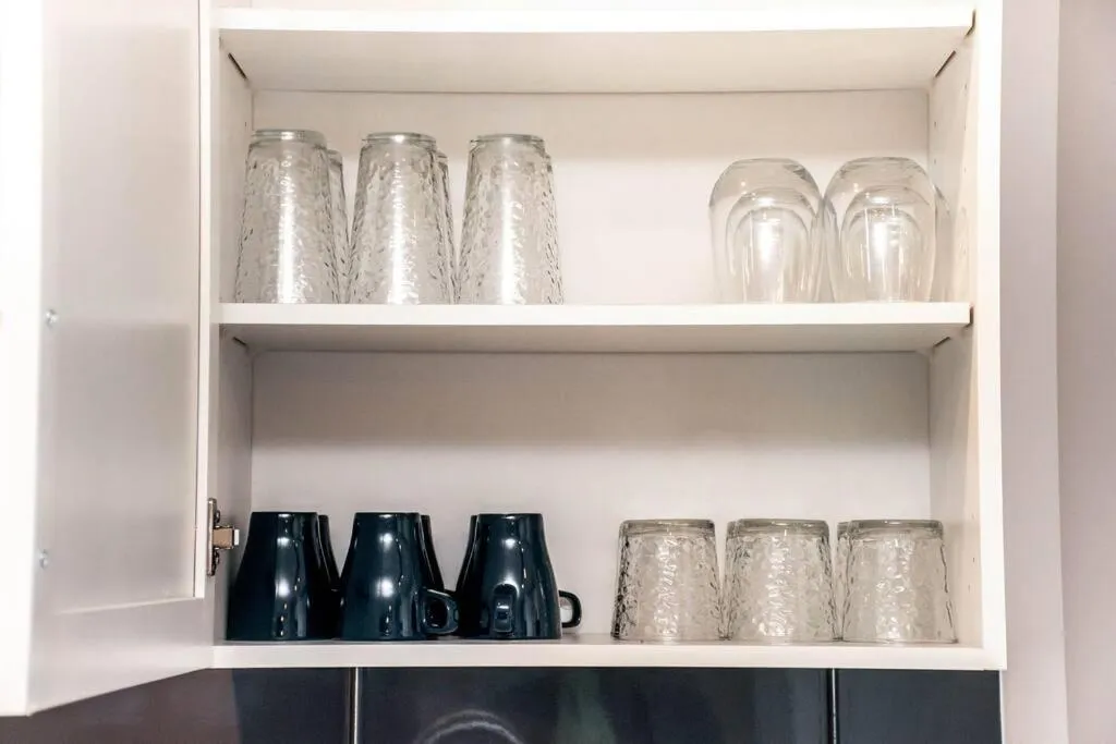 kitchen in Bright Luxe Condo, AC, Top Floor, King Bed, Balcony!