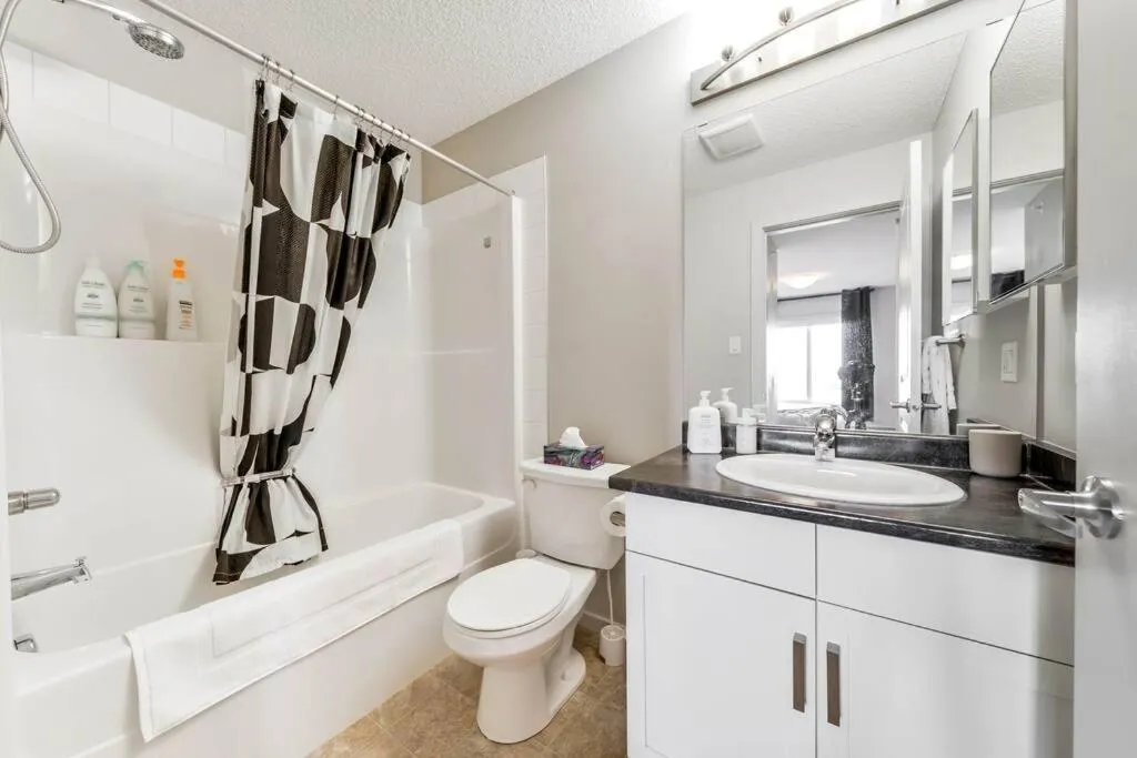 Shower in Bright Luxe Condo, AC, Top Floor, King Bed, Balcony!