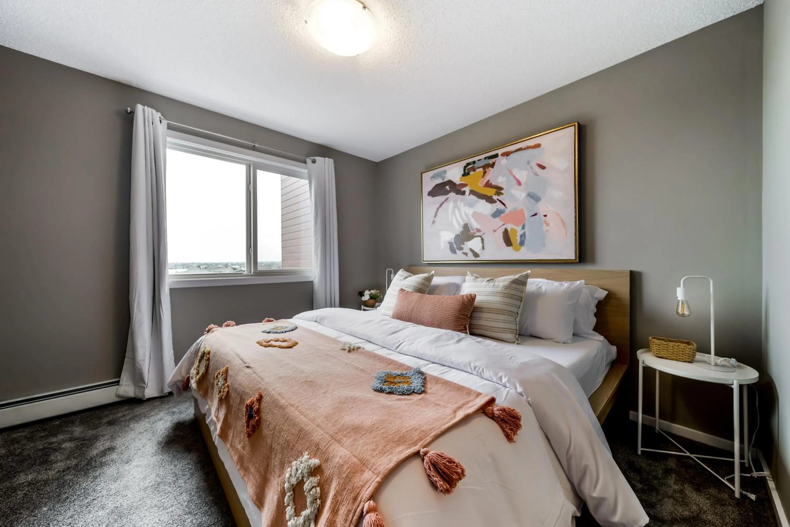 Bed in Peaceful Oasis Condo, AC, Top Floor, Secure UG Parking, Balcony, King Bed!