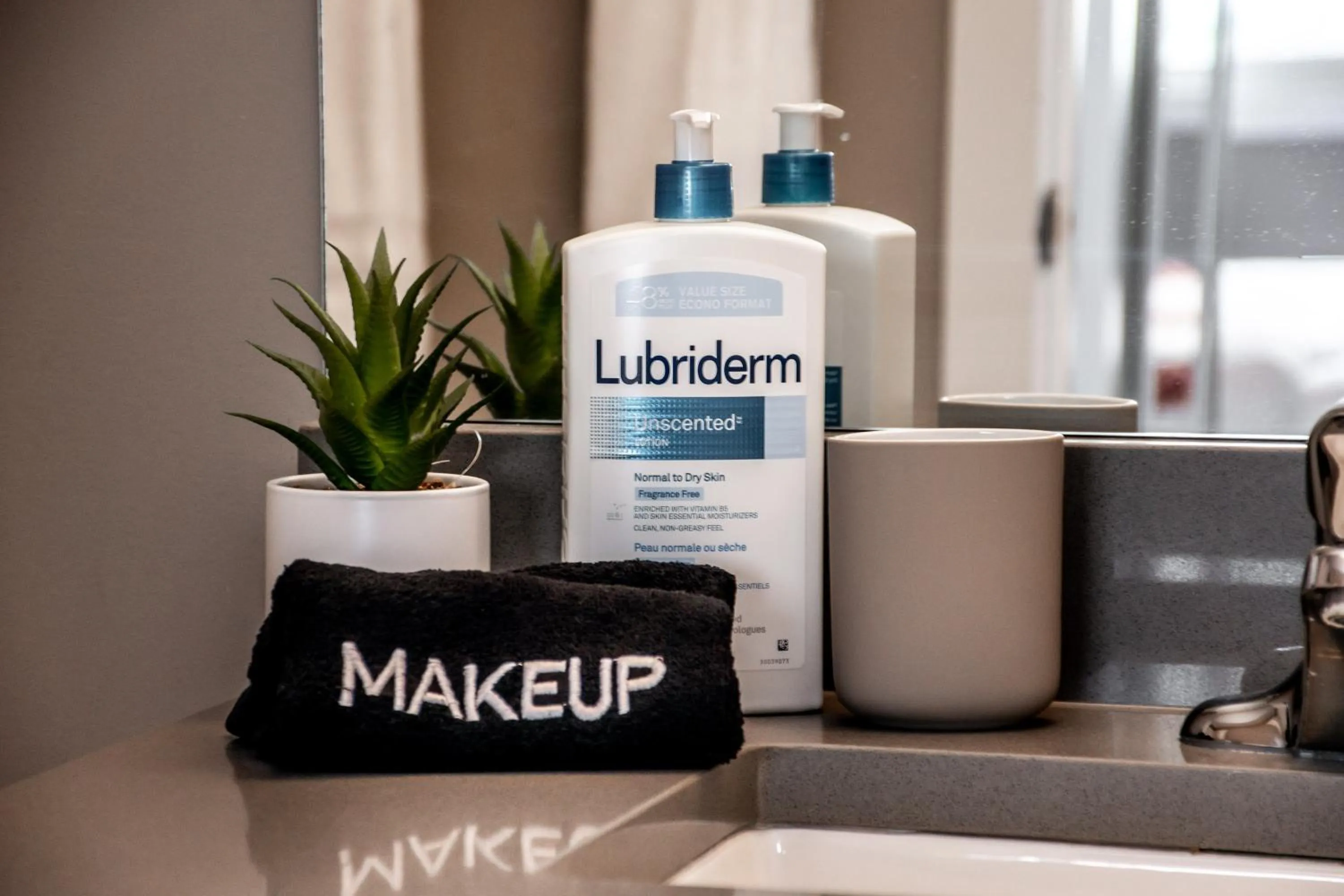 Bathroom in Peaceful Oasis Condo, AC, Top Floor, Secure UG Parking, Balcony, King Bed!