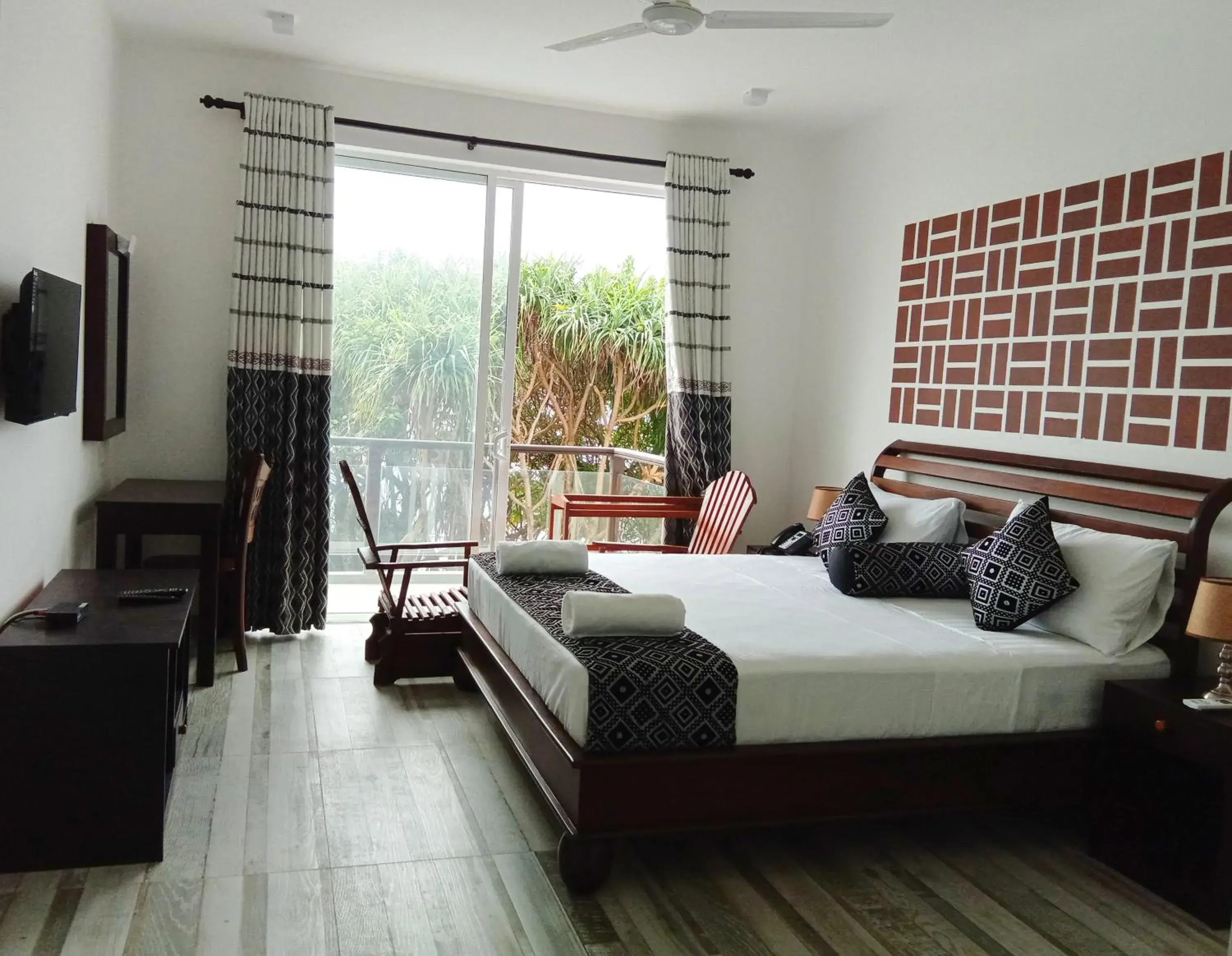 Communal lounge/ TV room, Bed in ARA Beach Resort Mirissa Communal lounge/ TV room, Bed in ARA Beach Resort Mirissa