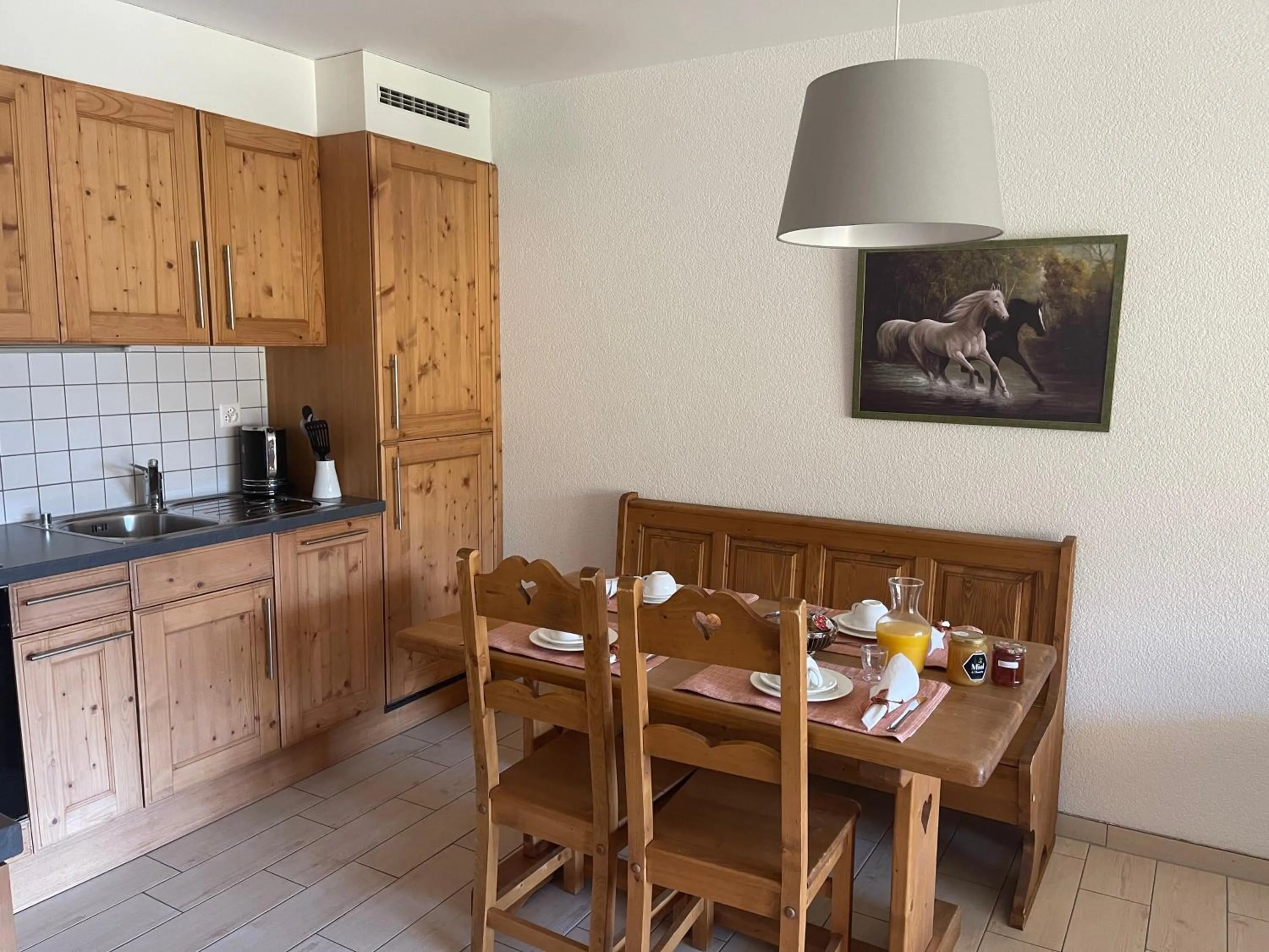 Kitchen or kitchenette in Mountain River Appart