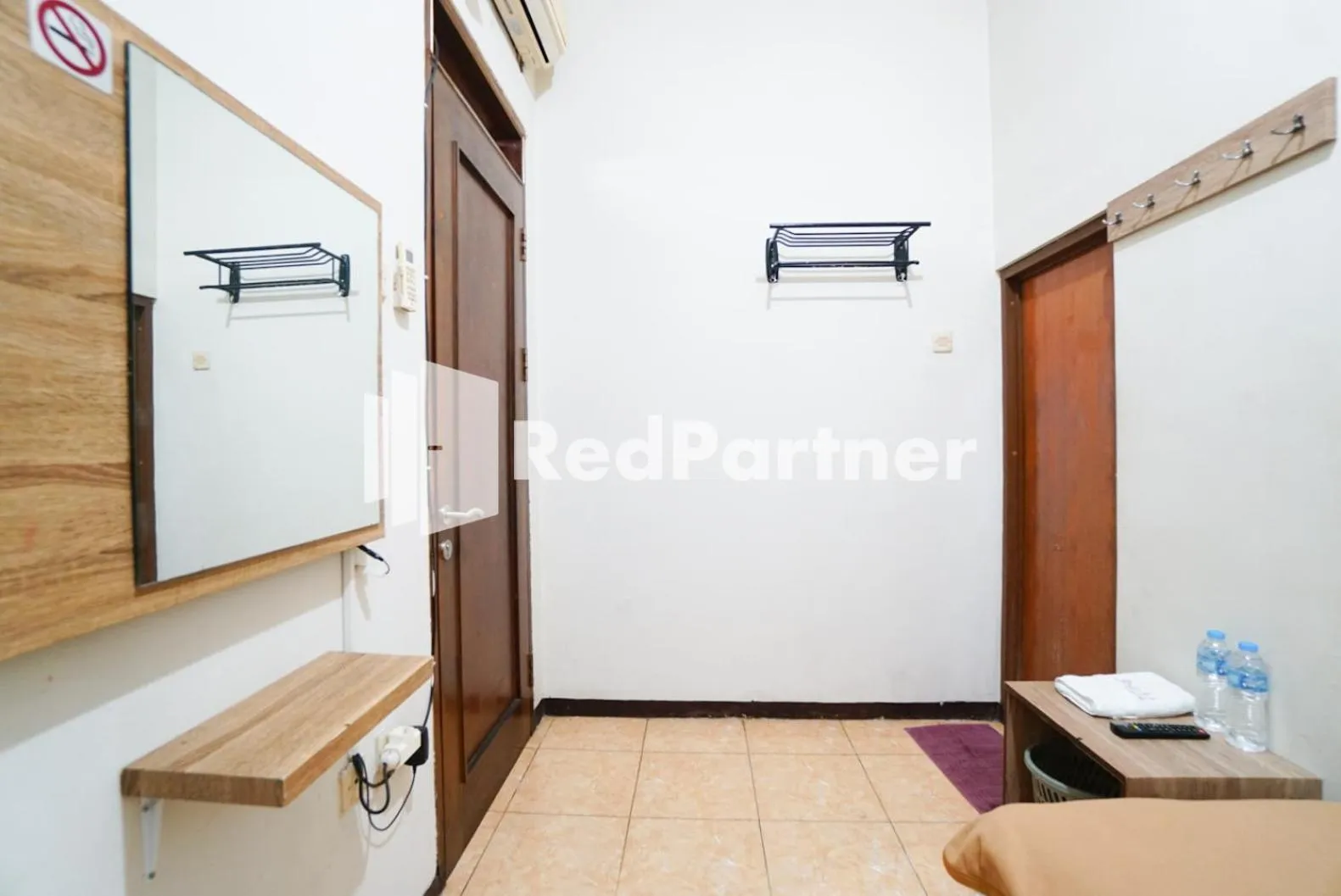 Bedroom in Bright Residence near ITC Mangga Dua Mitra RedDoorz