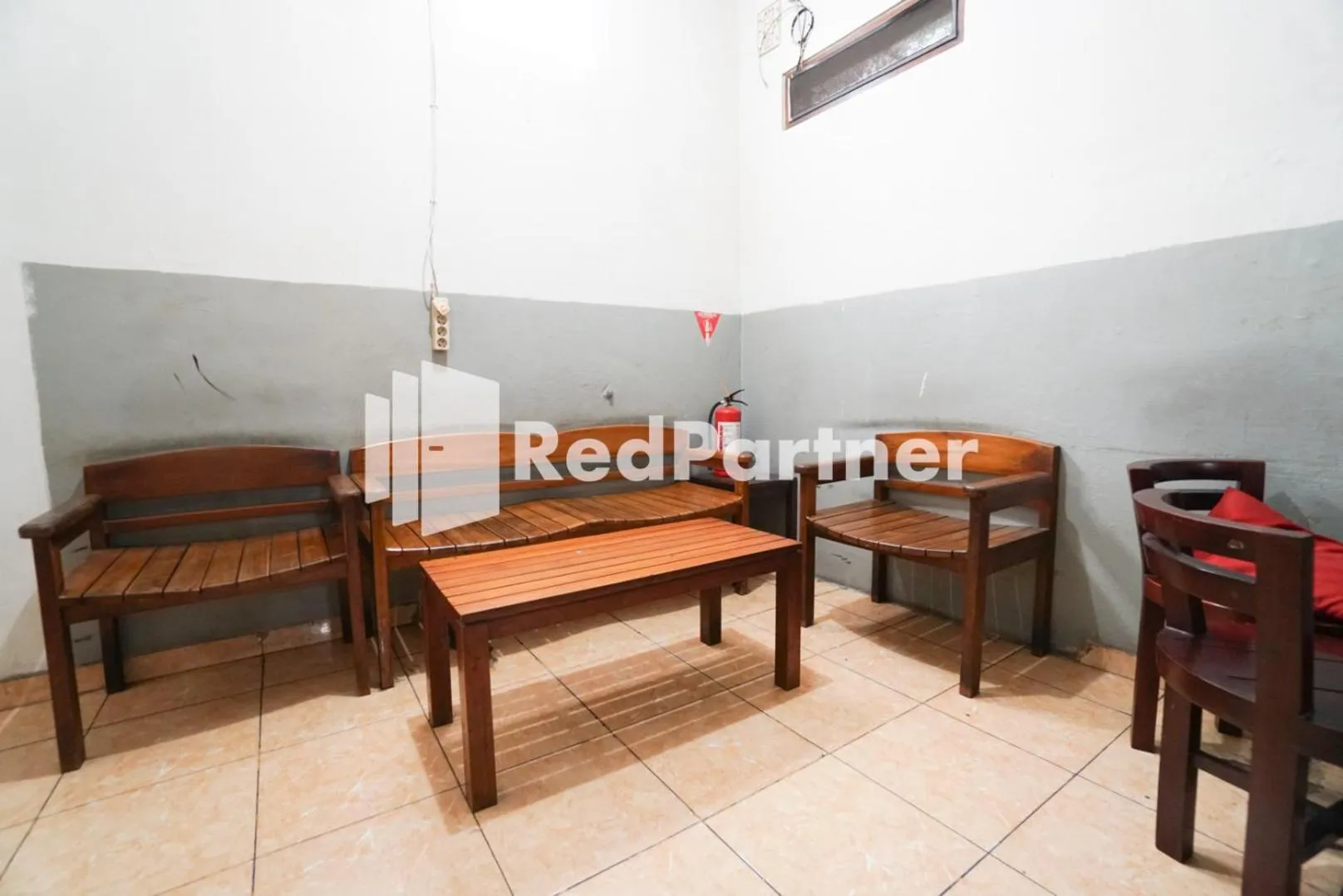 Living room in Bright Residence near ITC Mangga Dua Mitra RedDoorz