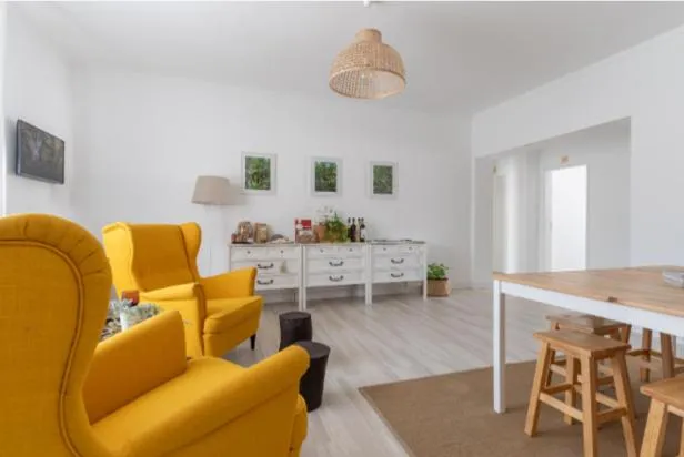 Communal lounge/ TV room in Galagana Charm House