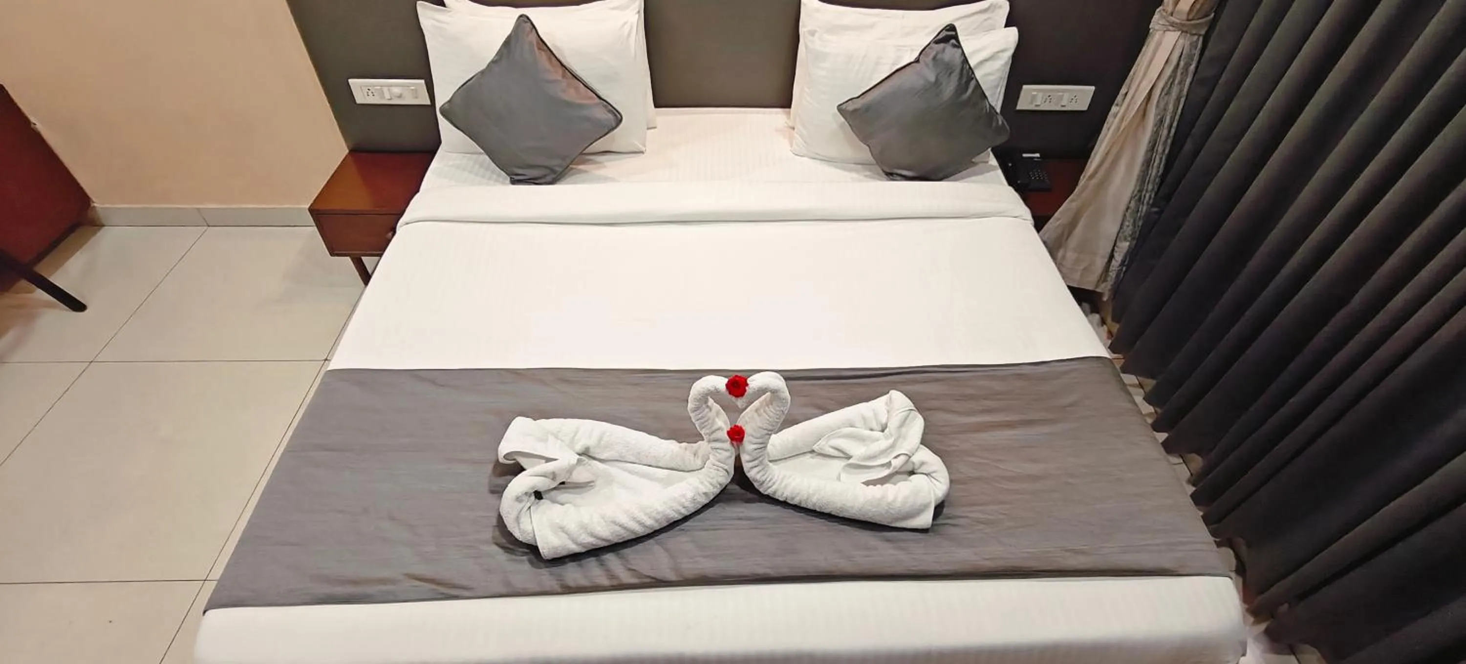 Bed in PGC Chennai Resort & Club By SSS